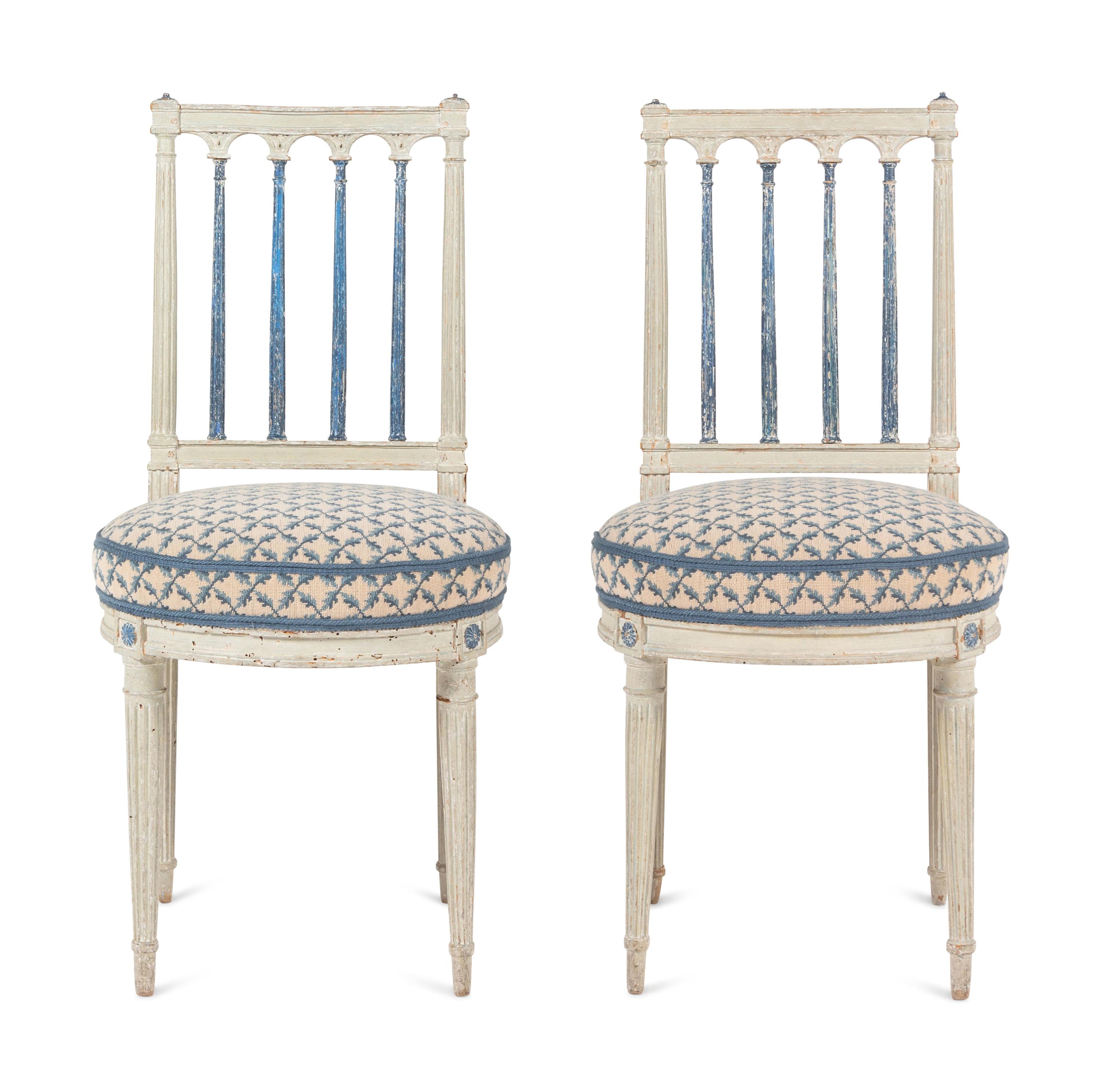 A Set of Four Louis XVI Blue and White-Painted Side Chairs