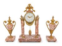 A French Gilt-Metal and Marble Three-Piece Clock Garniture