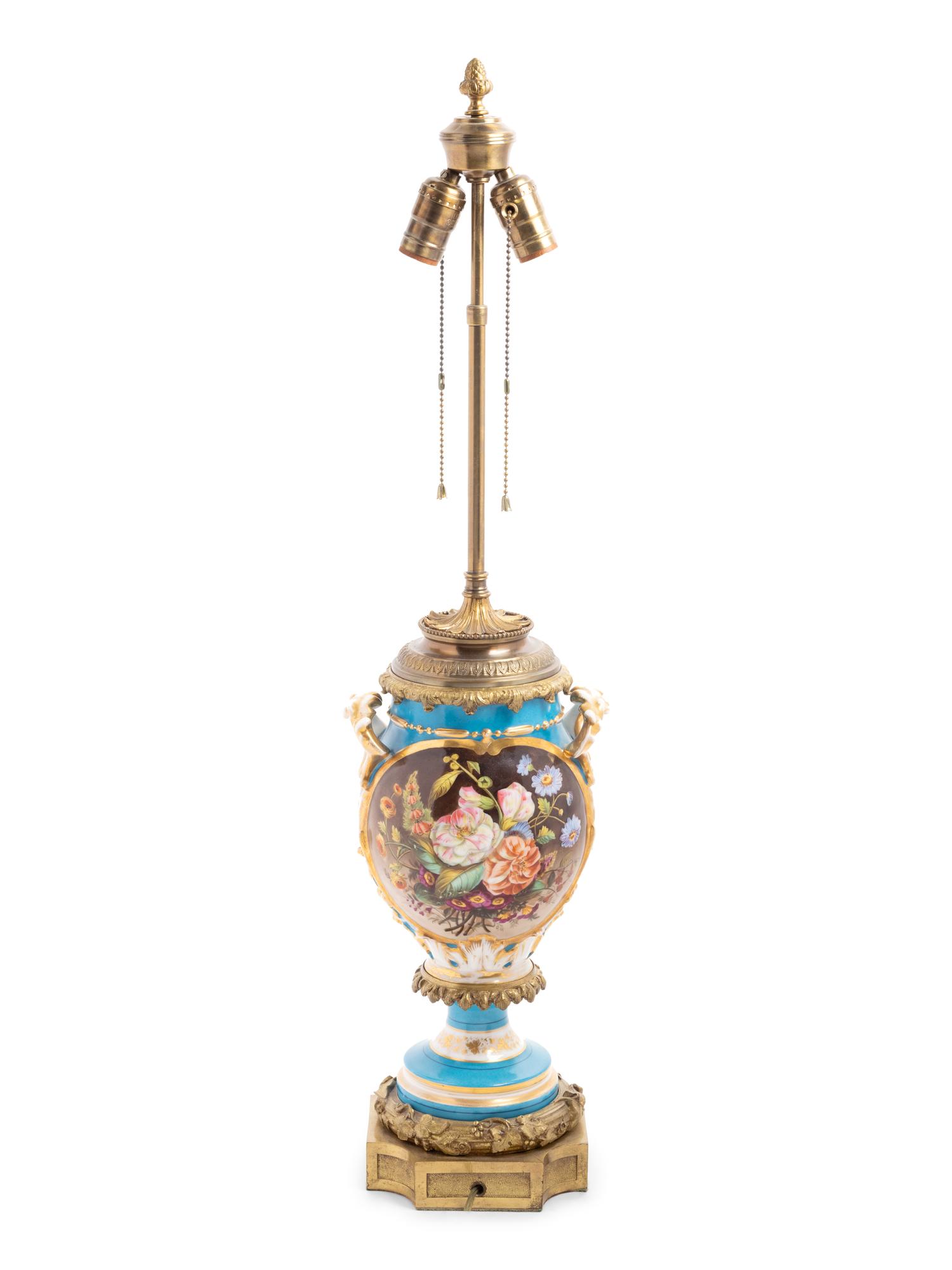 A Continental Gilt Bronze Mounted Porcelain Lamp