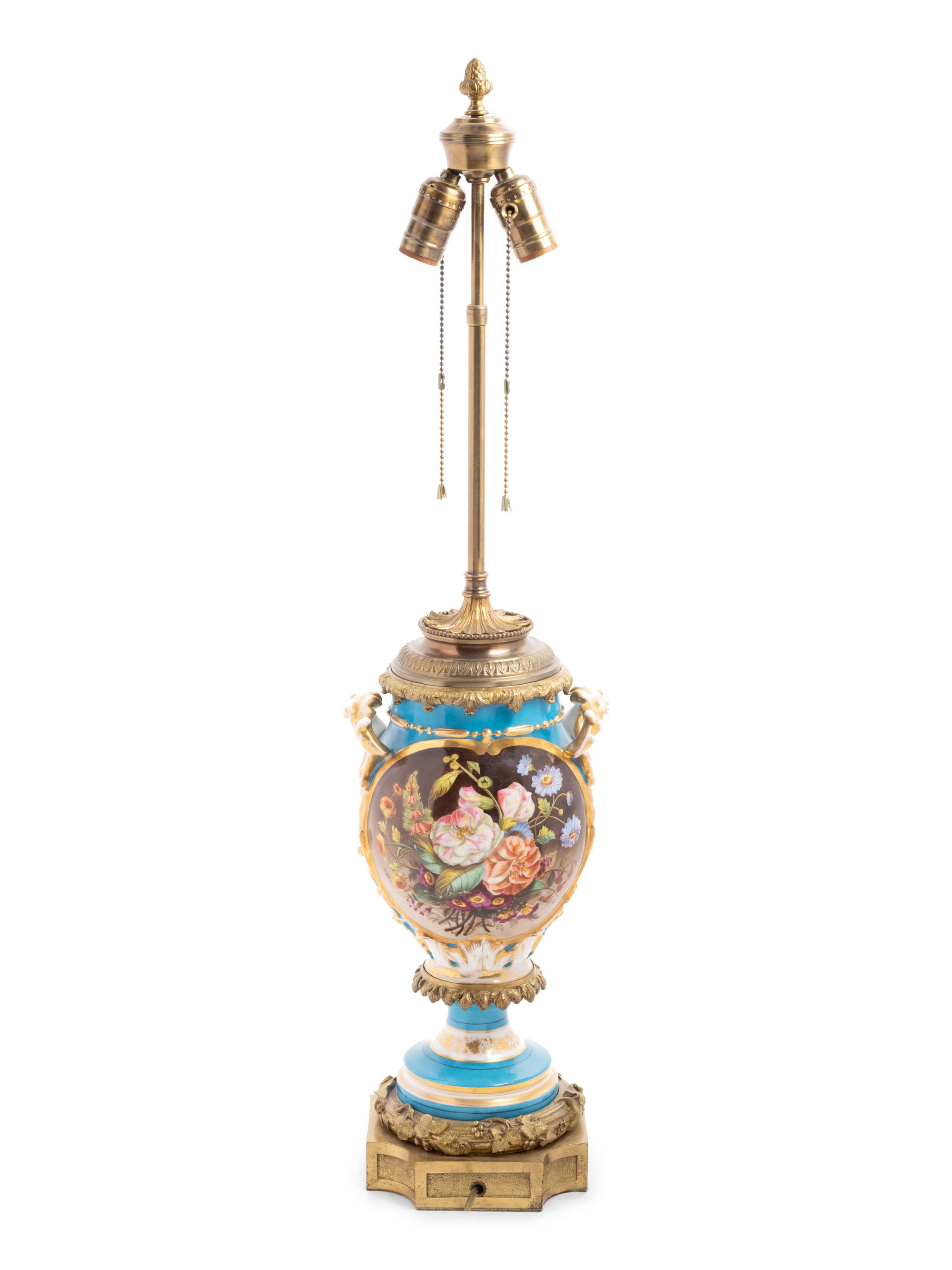 A Continental Gilt Bronze Mounted Porcelain Lamp