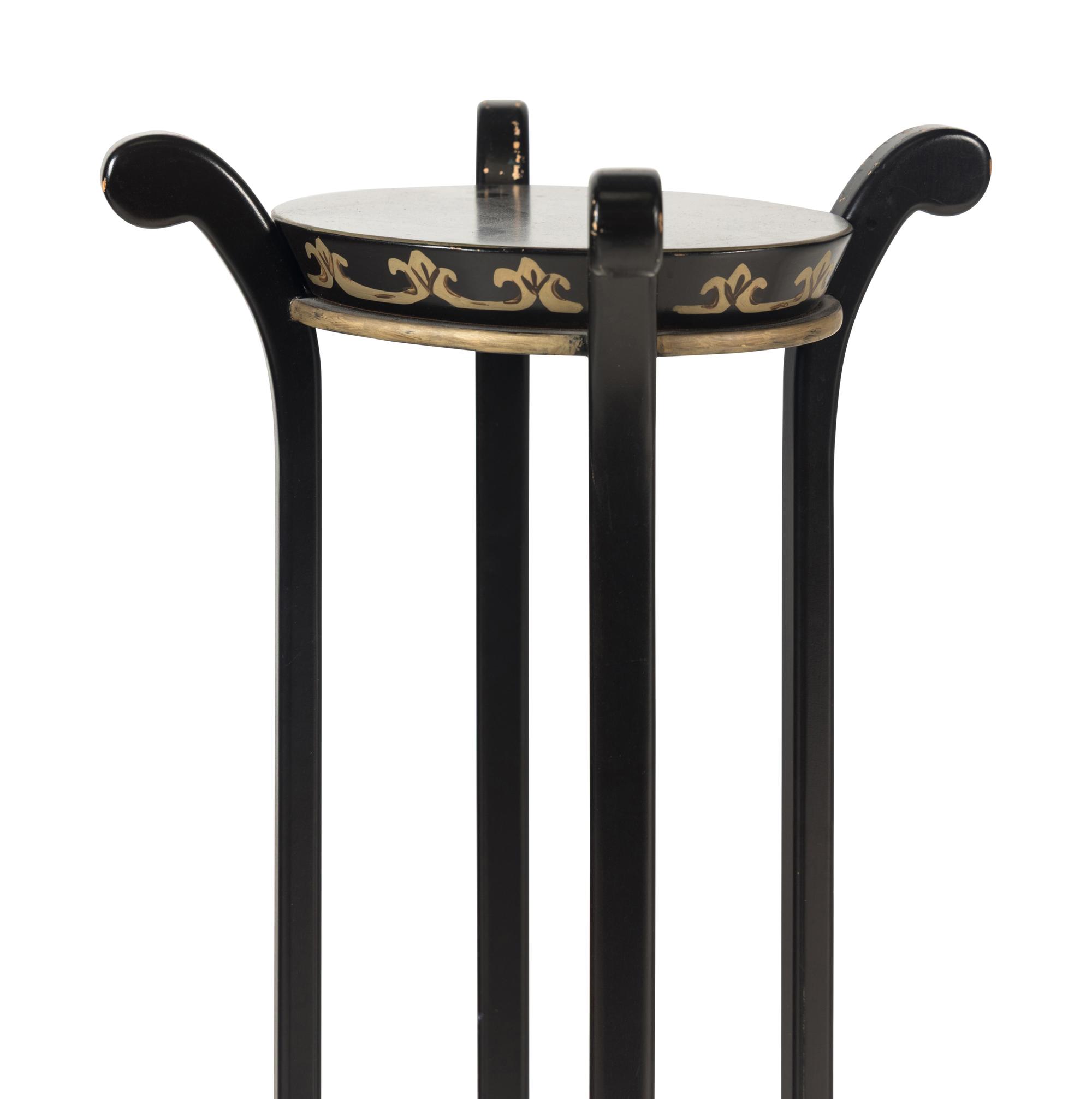 A Pair of Ebonized and Parcel-Gilt Jardinière Stands