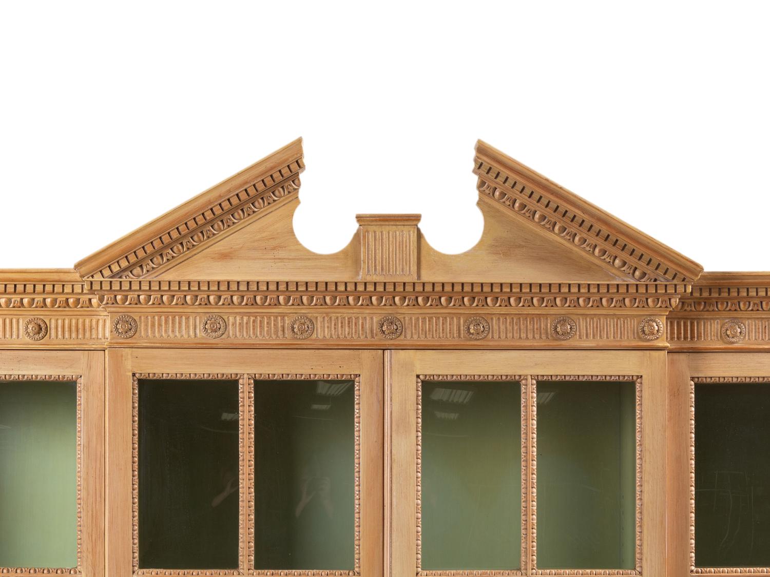 A George III Style Carved Pine Breakfront Bookcase