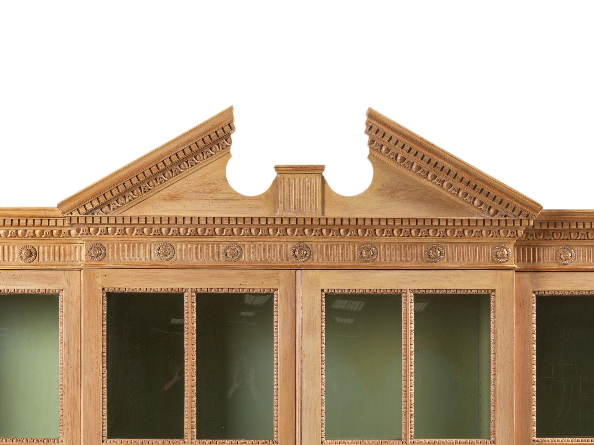 A George III Style Carved Pine Breakfront Bookcase