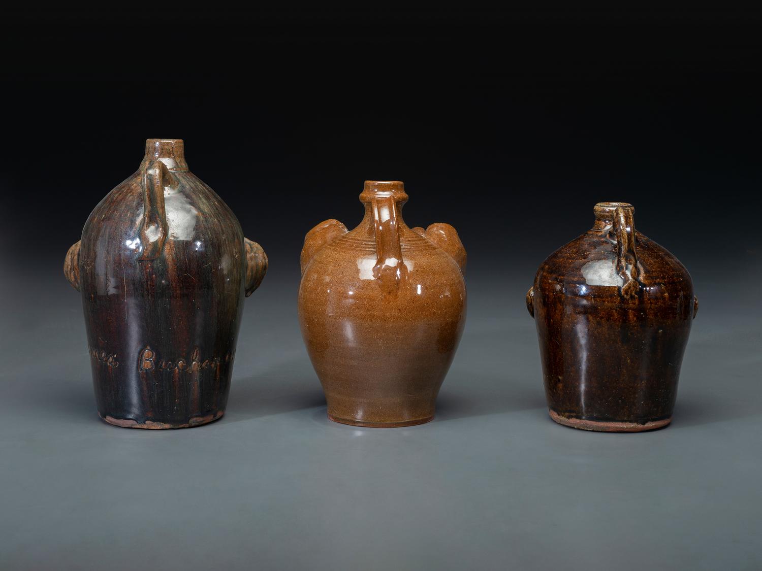 Three Southern Stoneware Face Jugs