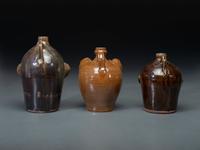 Three Southern Stoneware Face Jugs