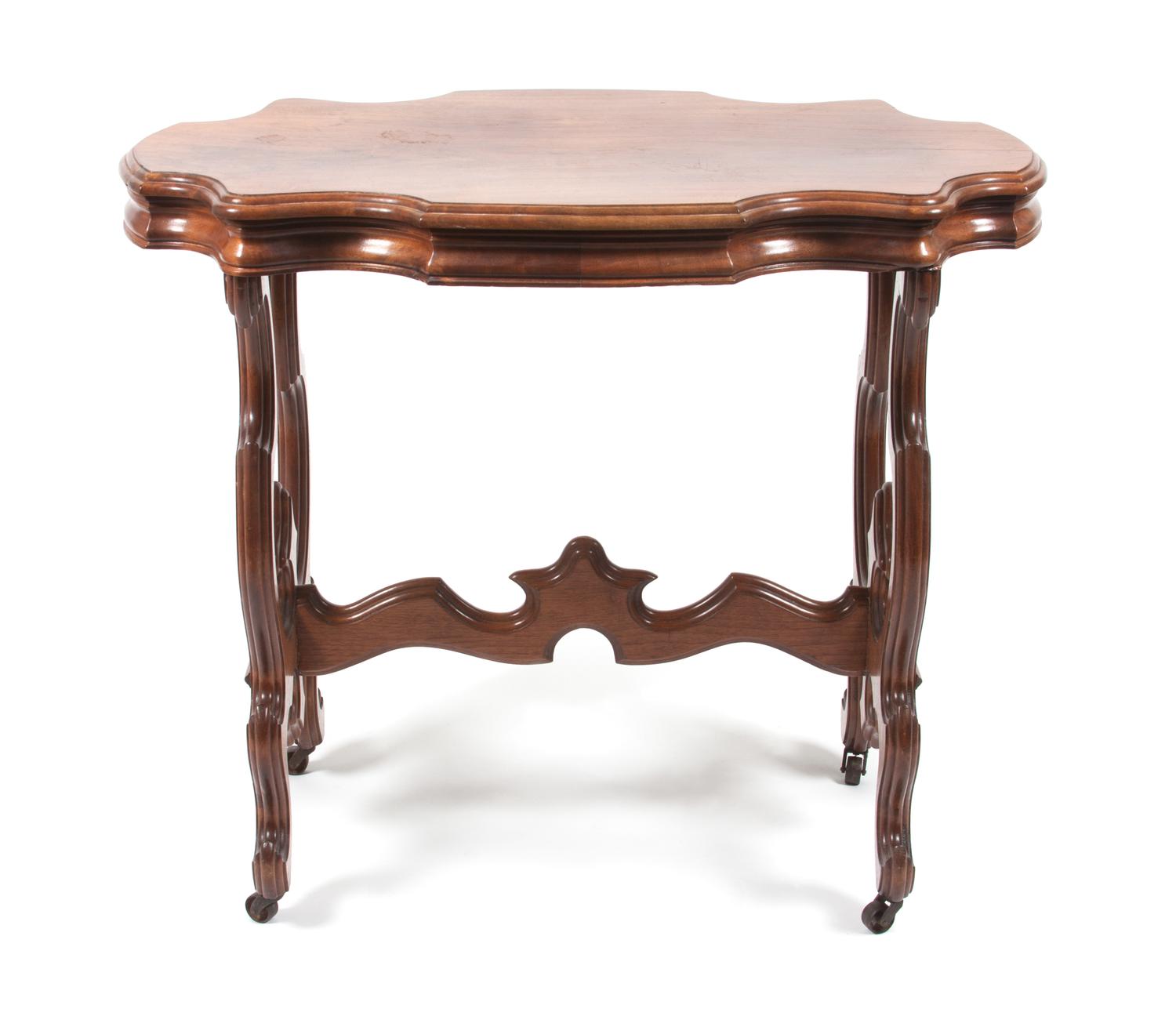 A Victorian Walnut Center Table Height 20 1/2 x width 26 x depth 22 1/2 inches. — 19TH/20TH CENTURY