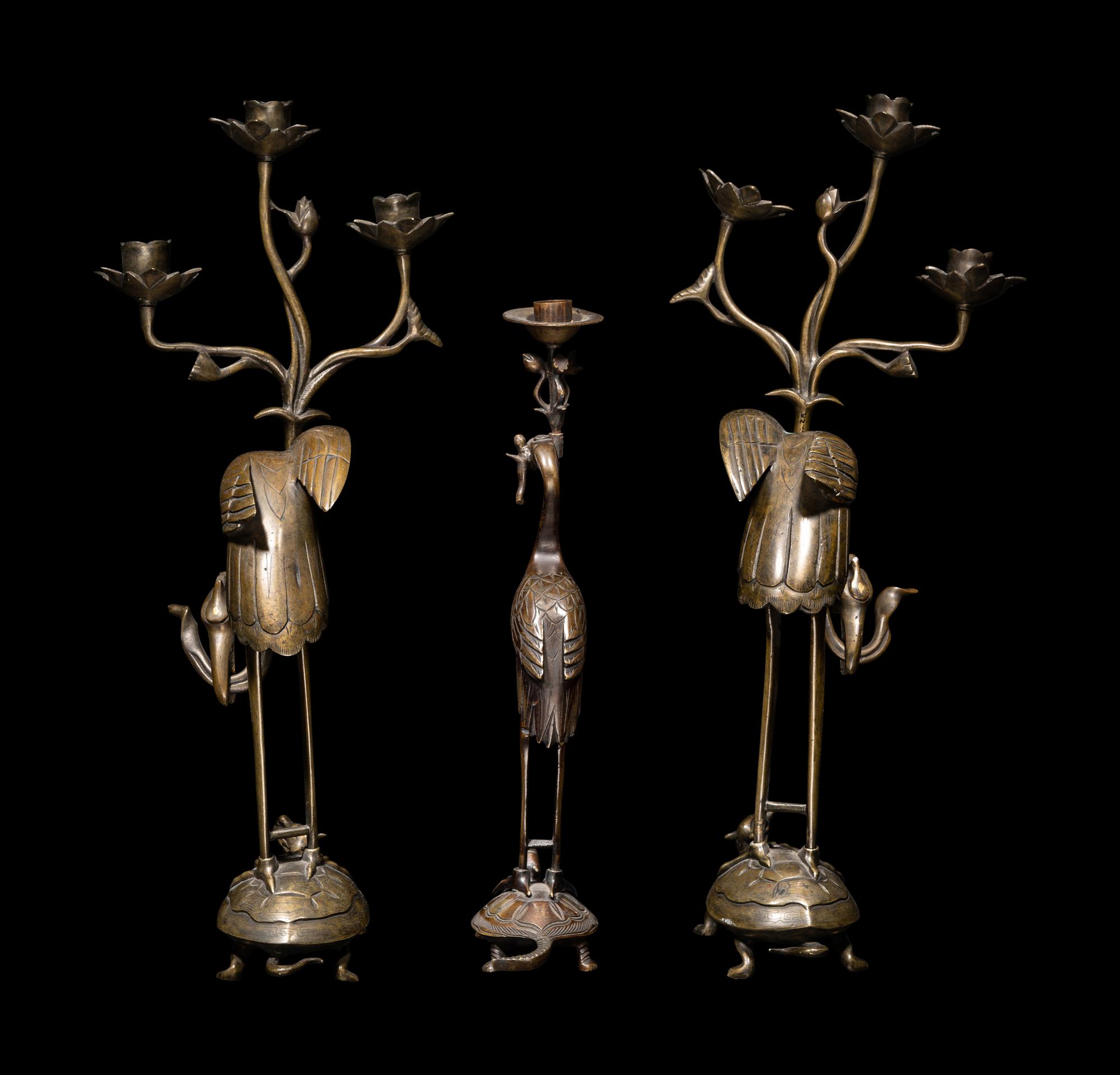 Three Chinese Bronze 'Turtle and Crane' Candle Holders