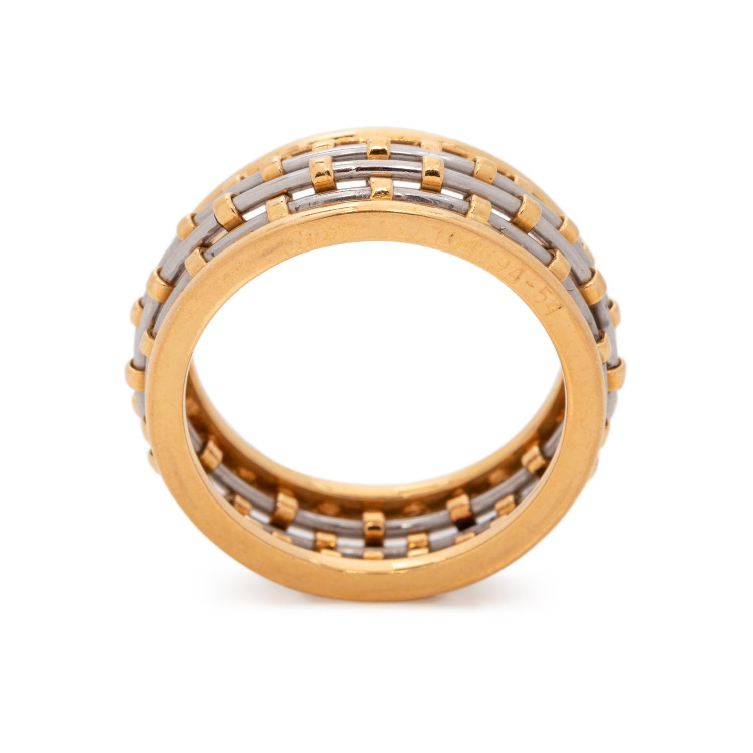 CARTIER, YELLOW GOLD AND STEEL RING
