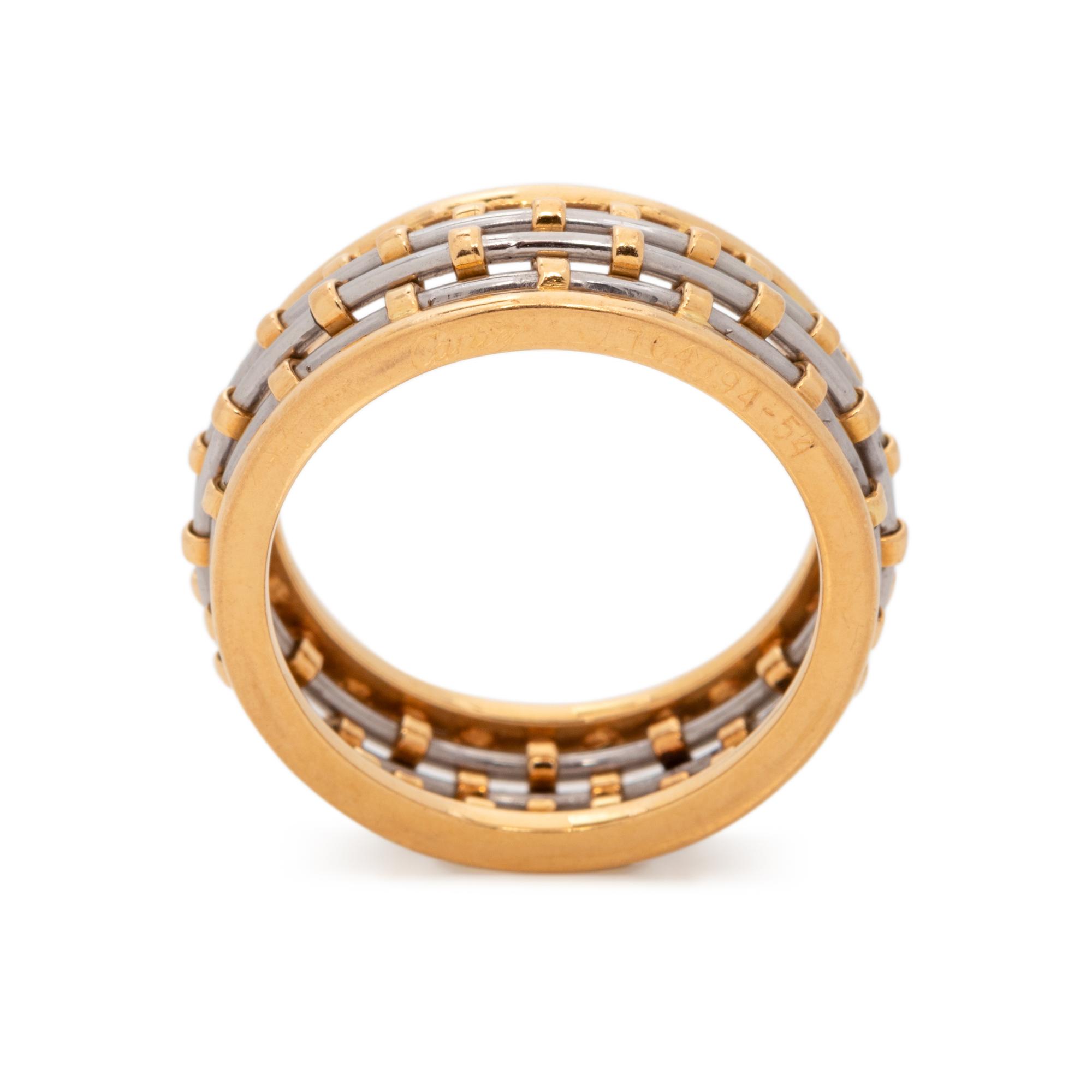 CARTIER, YELLOW GOLD AND STEEL RING