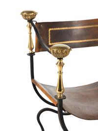 A Near Pair of Continental Iron and Brass Curule Armchairs