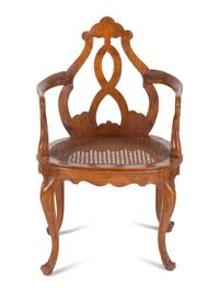 An English Caned Walnut Armchair