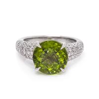 An 18 Karat White Gold, Peridot and Diamond Ring,