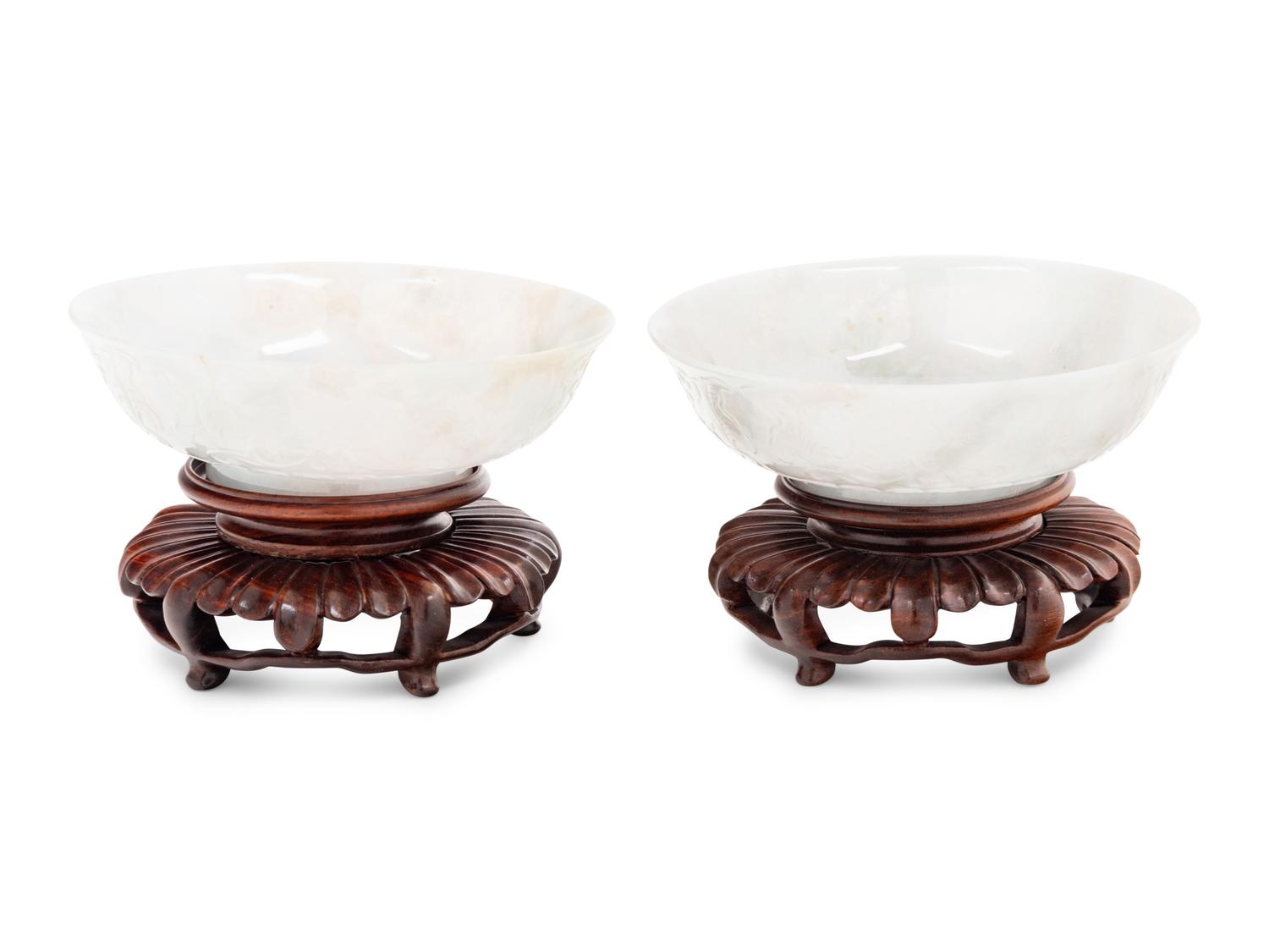 A Pair of Chinese White Jadeite 'Lotus' Bowls
