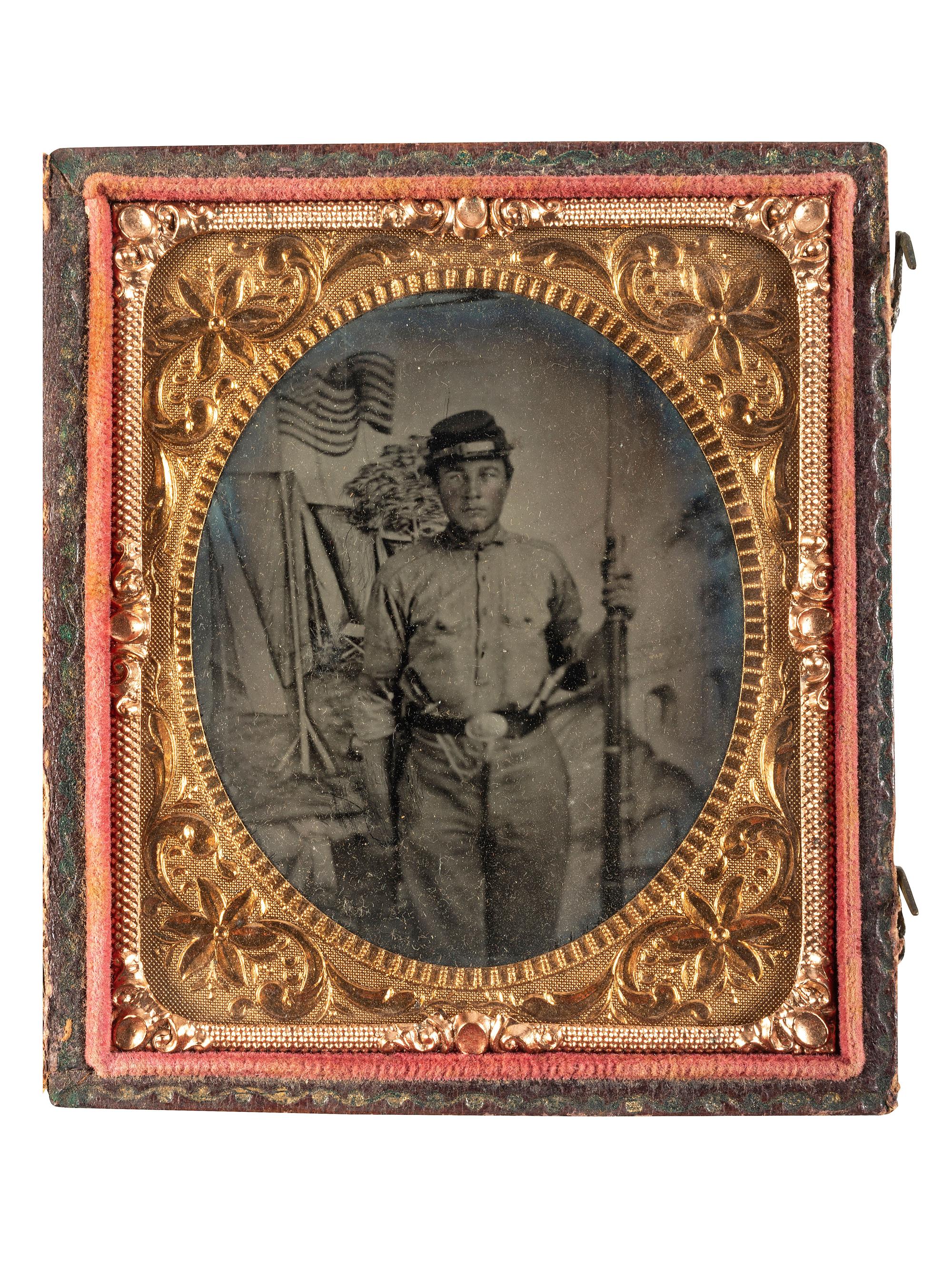 [CIVIL WAR]. Sixth plate ambrotype, period copy image of a double-armed Union soldier. Ca 1861.