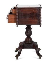 A Classical Carved and Figured Mahogany Pressed Glass Mounted Two-Drawer Work Stand