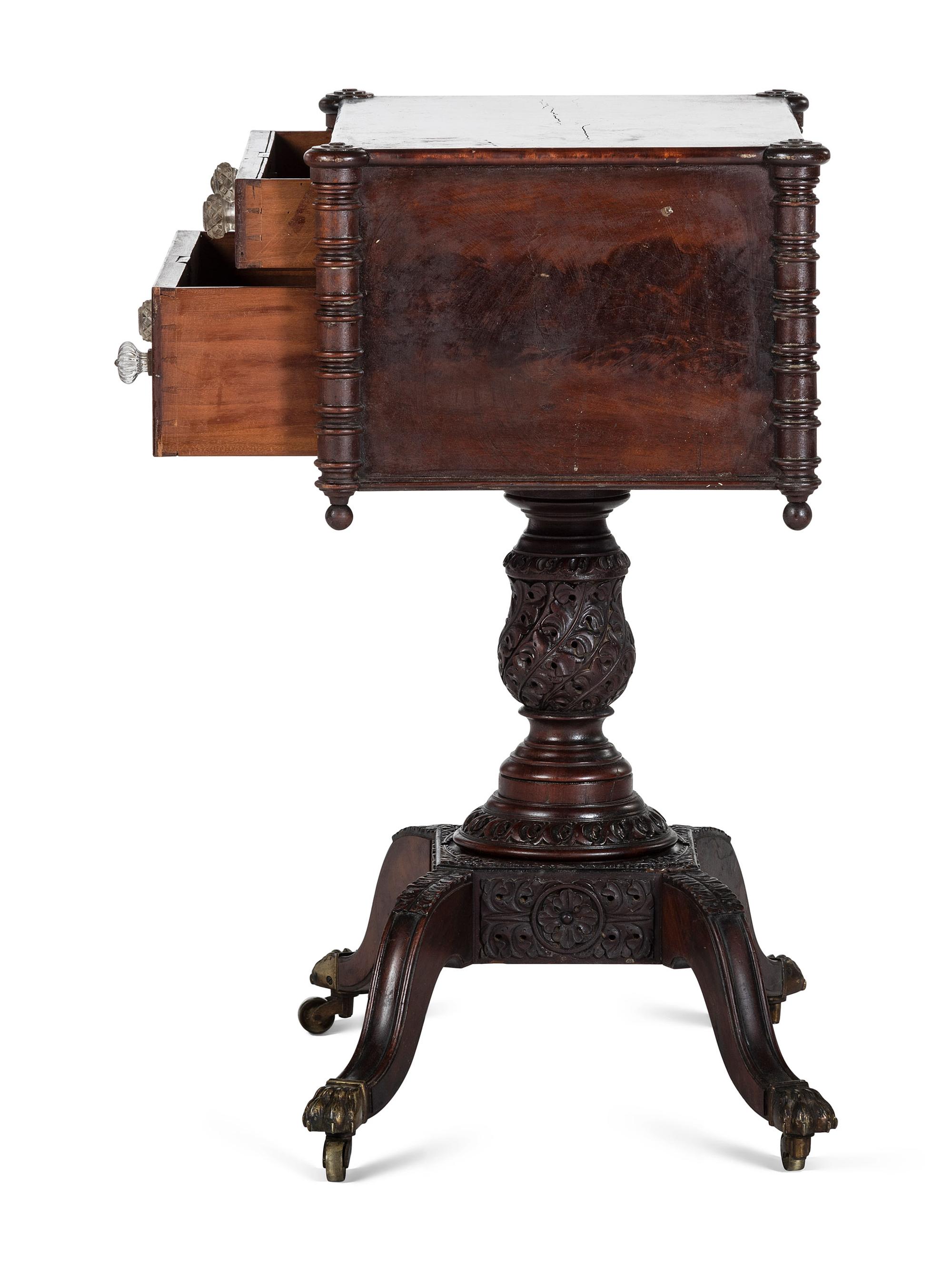 A Classical Carved and Figured Mahogany Pressed Glass Mounted Two-Drawer Work Stand