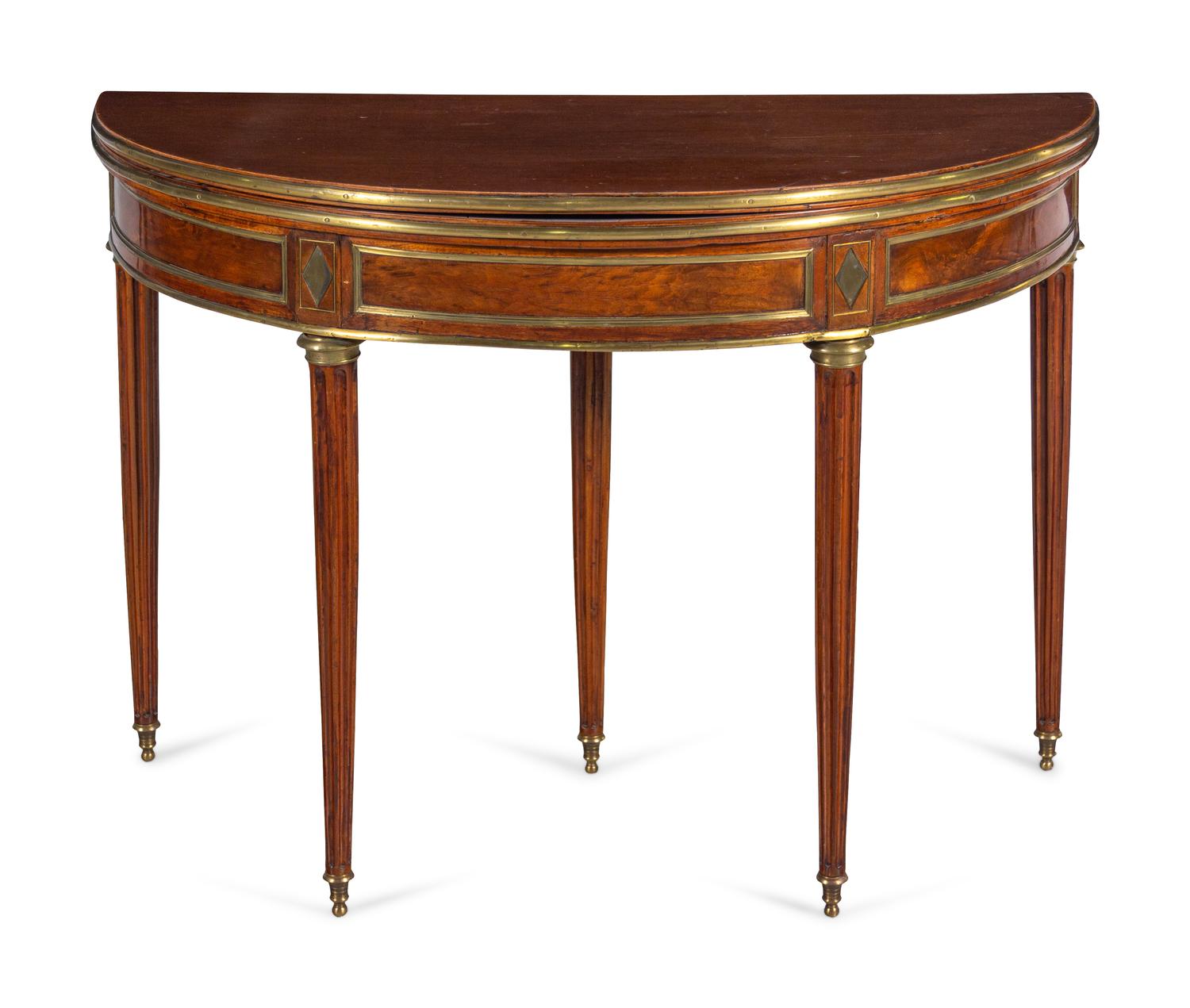A Louis XVI Gilt Metal Mounted Mahogany Flip-Top Table