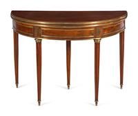 A Louis XVI Gilt Metal Mounted Mahogany Flip-Top Table