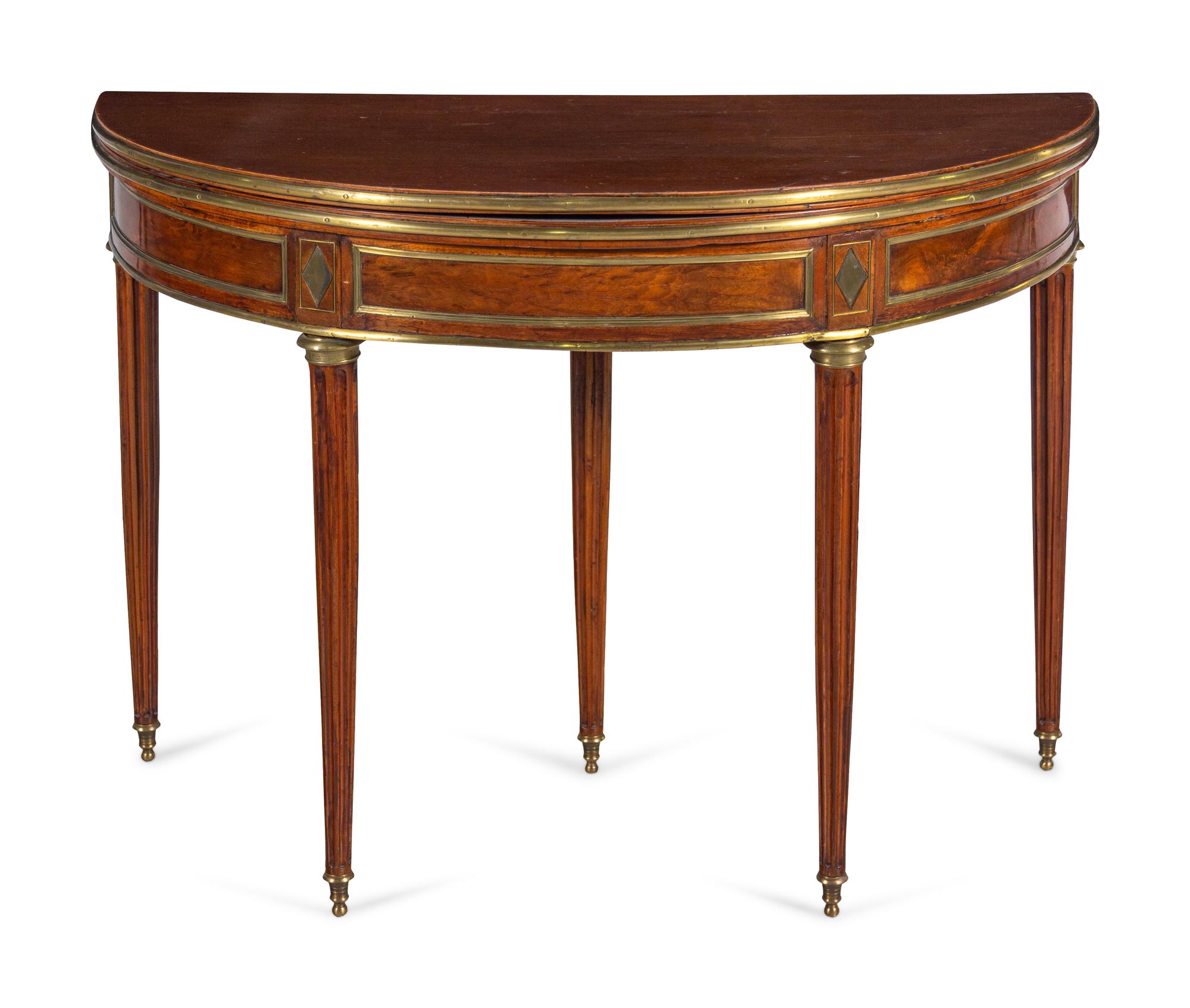 A Louis XVI Gilt Metal Mounted Mahogany Flip-Top Table
