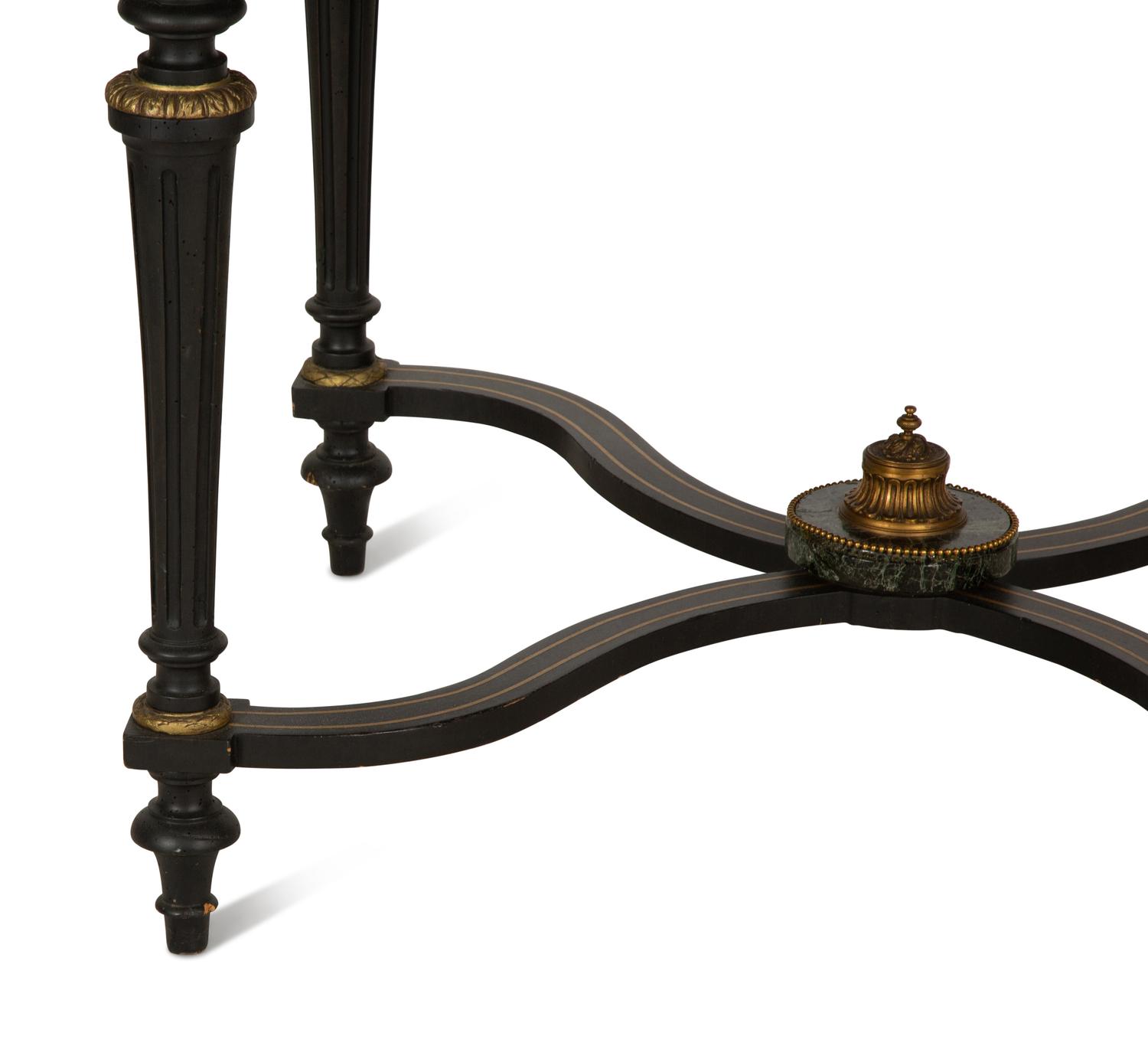 A Napoleon III Style Gilt-Bronze Mounted Ebonized Center Table