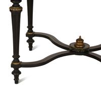 A Napoleon III Style Gilt-Bronze Mounted Ebonized Center Table
