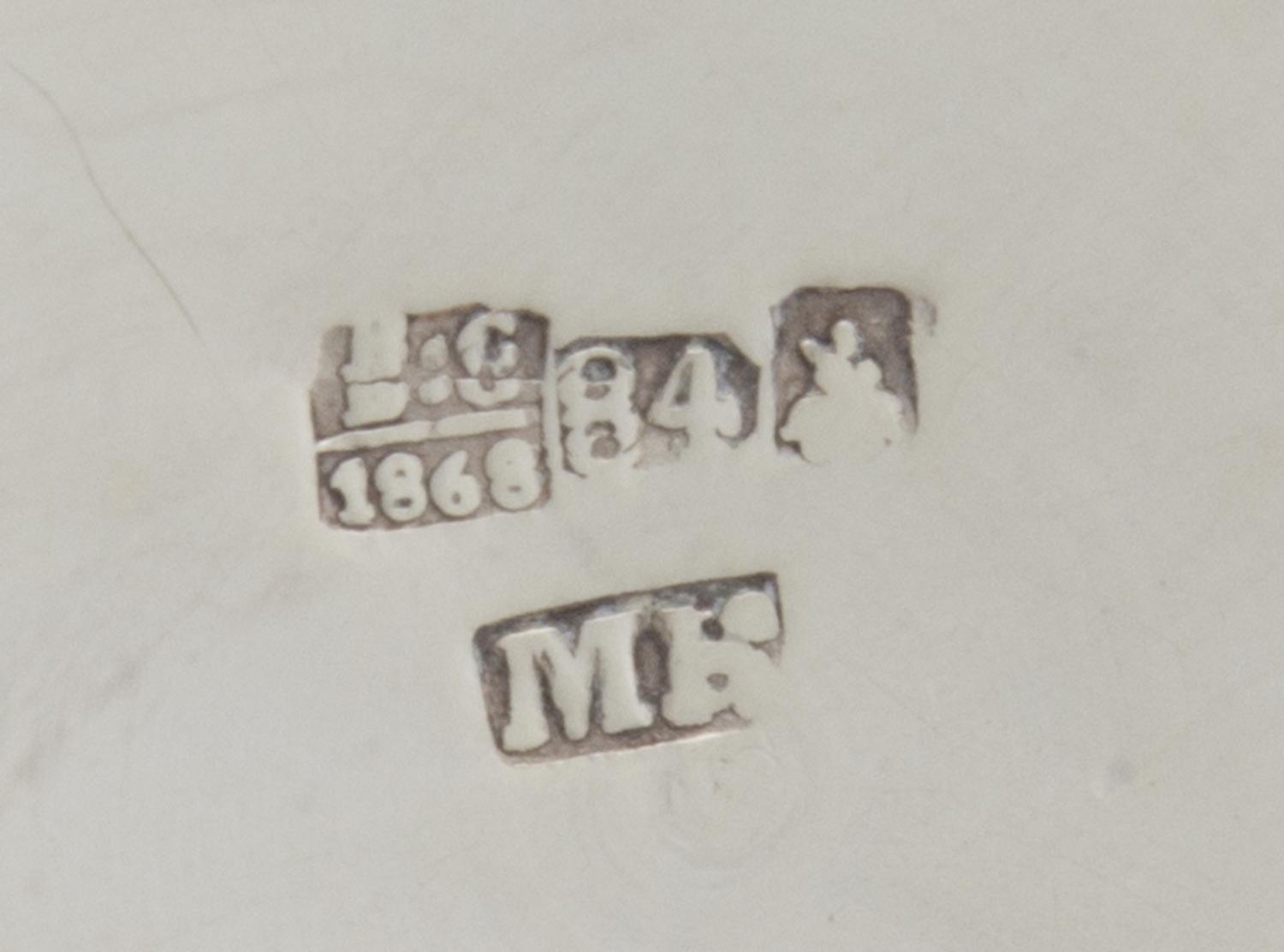 A Russian Silver Tankard, Mark of Michael Karpinsky, Assay of Viktor Savinsky, Moscow, 1868, the lid worked to show shaped panels enclo