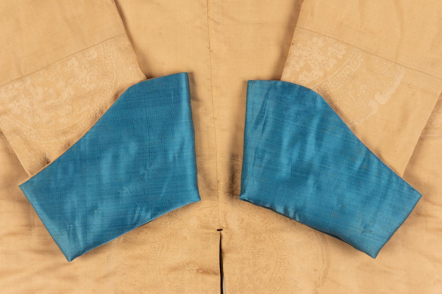 A Pale Yellow Silk and Cotton Padded Winter Robe