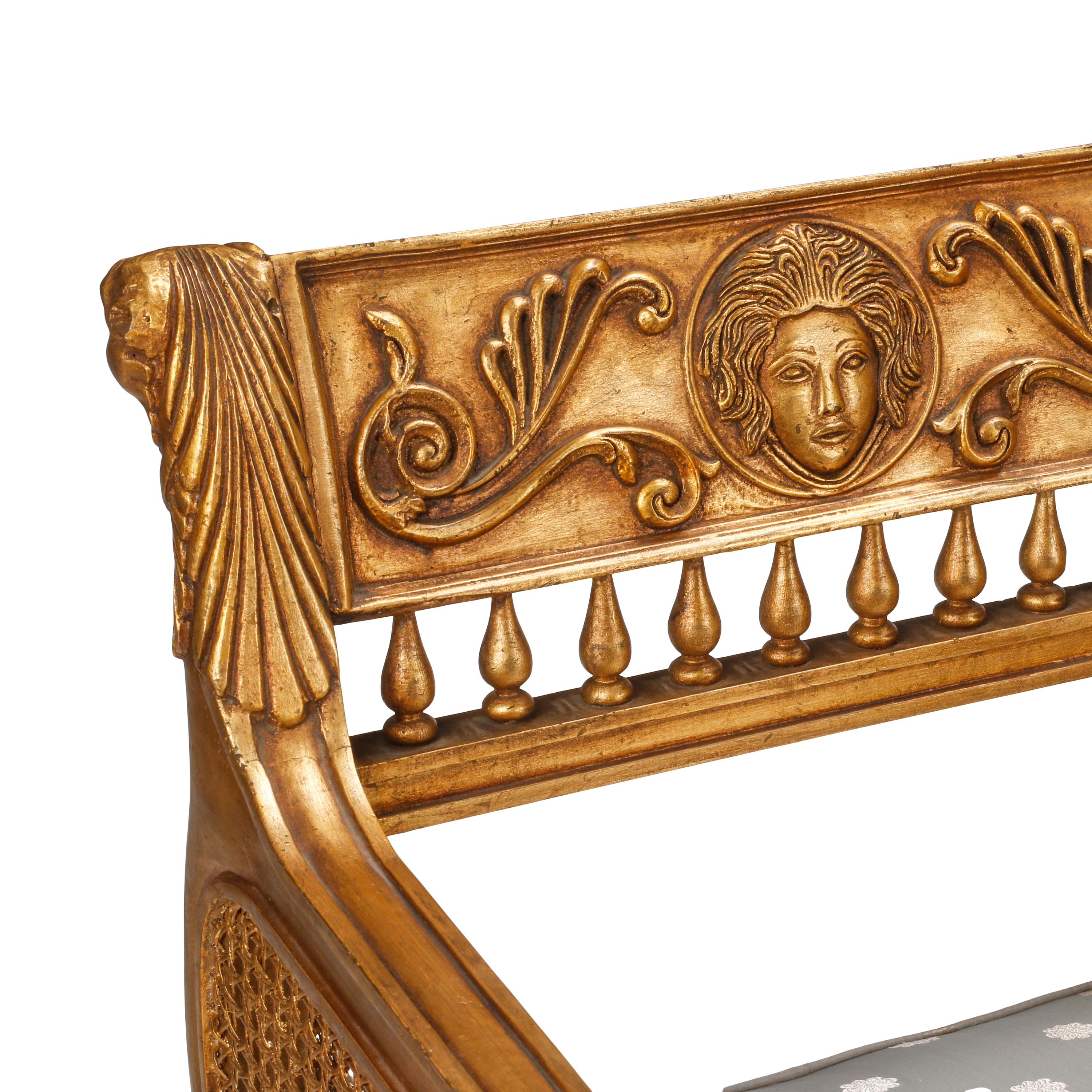 A Pair of Italian Neoclassical Style Giltwood and Cane Armchairs