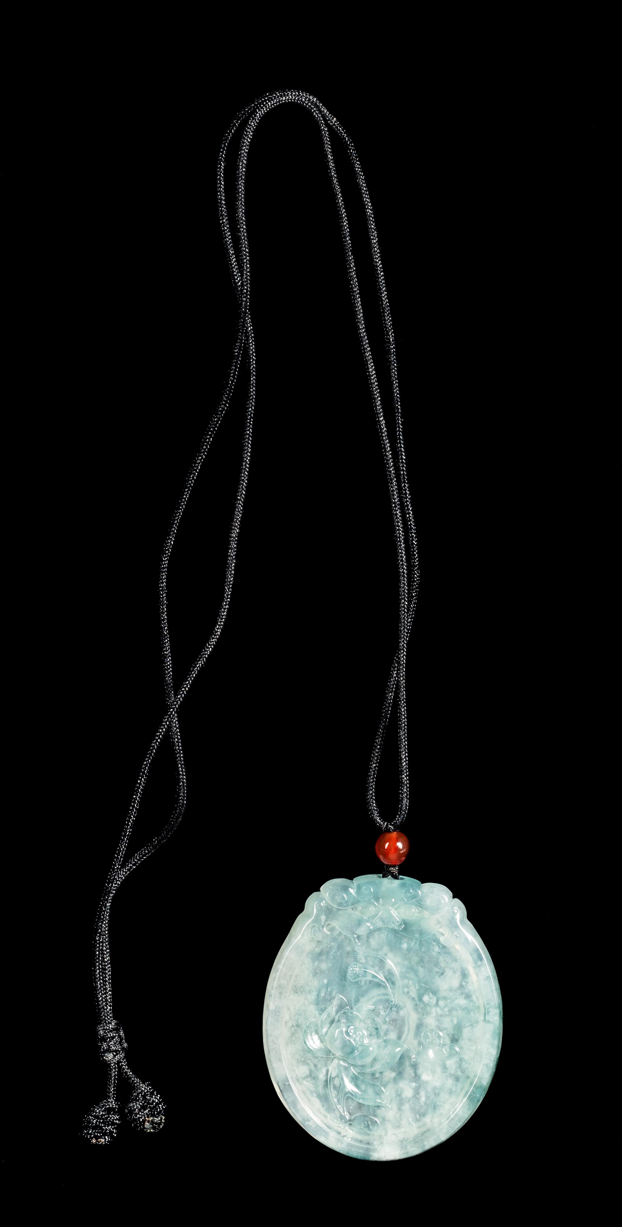 A Jadeite Lotus Pendant Length 2 inches. — 20TH CENTURY