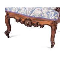 A Pair of Renaissance Revival Carved Walnut Fauteuils