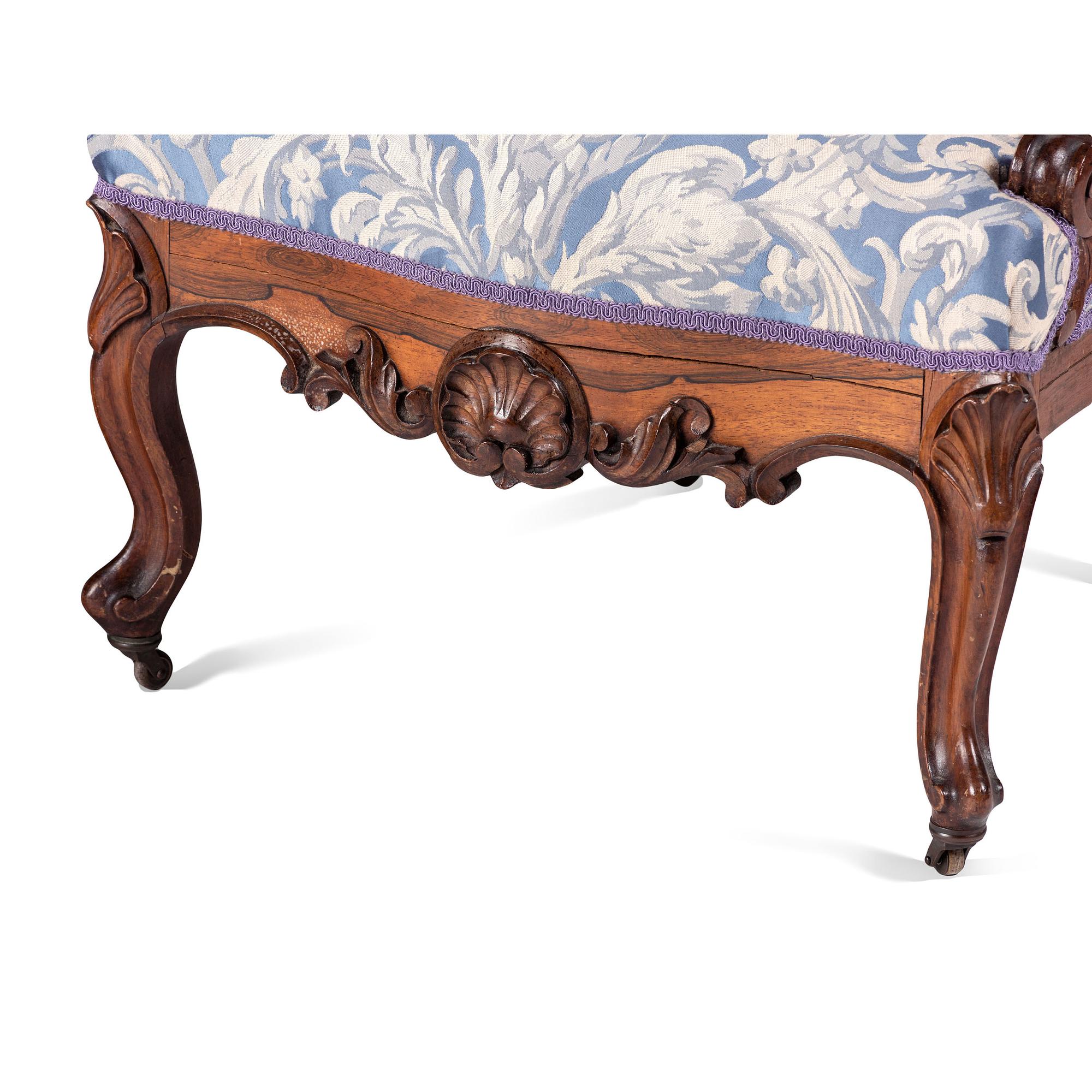 A Pair of Renaissance Revival Carved Walnut Fauteuils