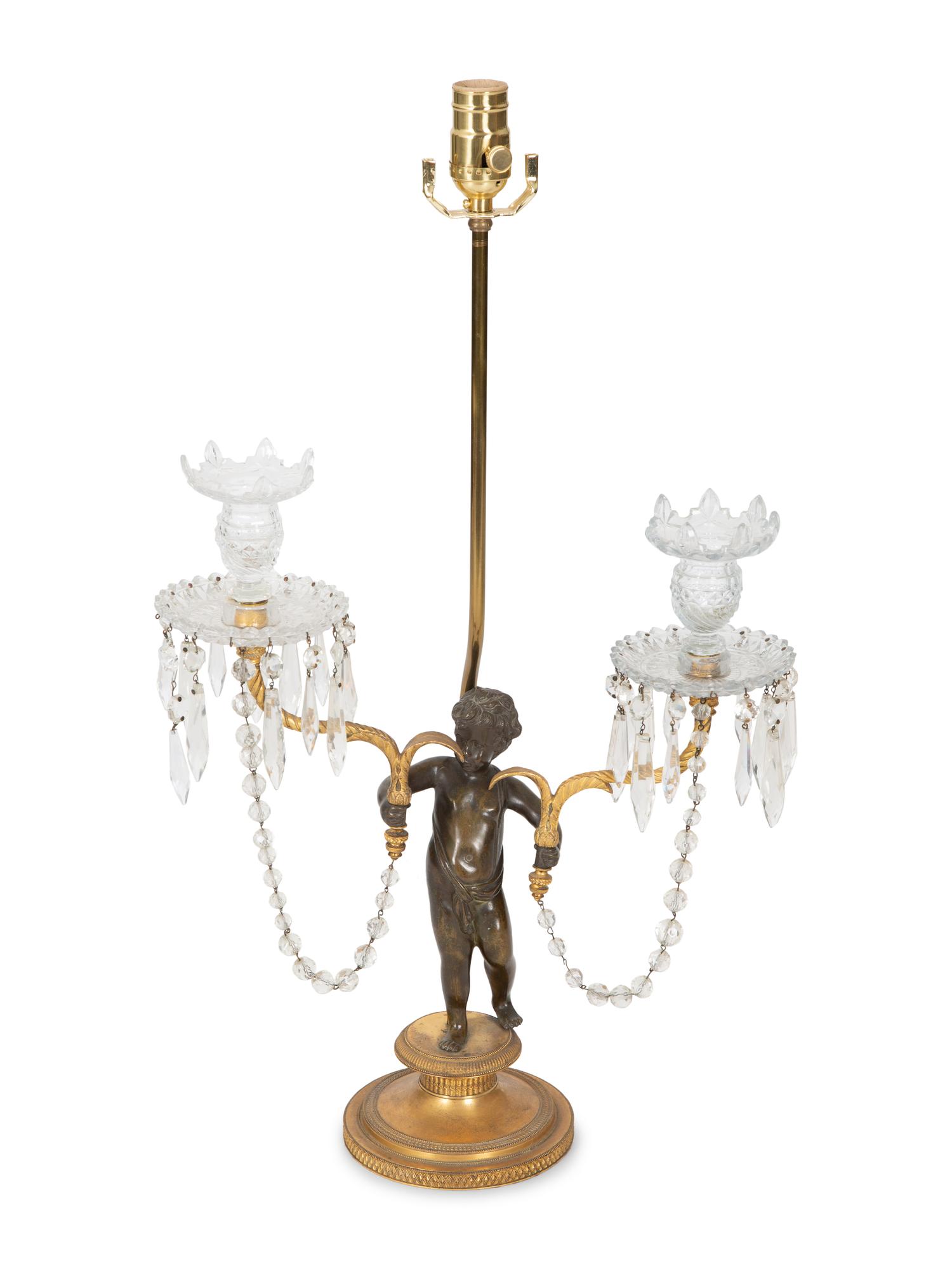 A Continental Bronze and Cut Glass Figural Candelabrum Mounted as a Lamp — 19TH CENTURY