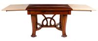 An Italian Art Nouveau Style Walnut Dining Suite Height of table 31 1/2 x width 47 1/2 (closed) x depth 40 1/4 inches. — 20TH CENTURY
