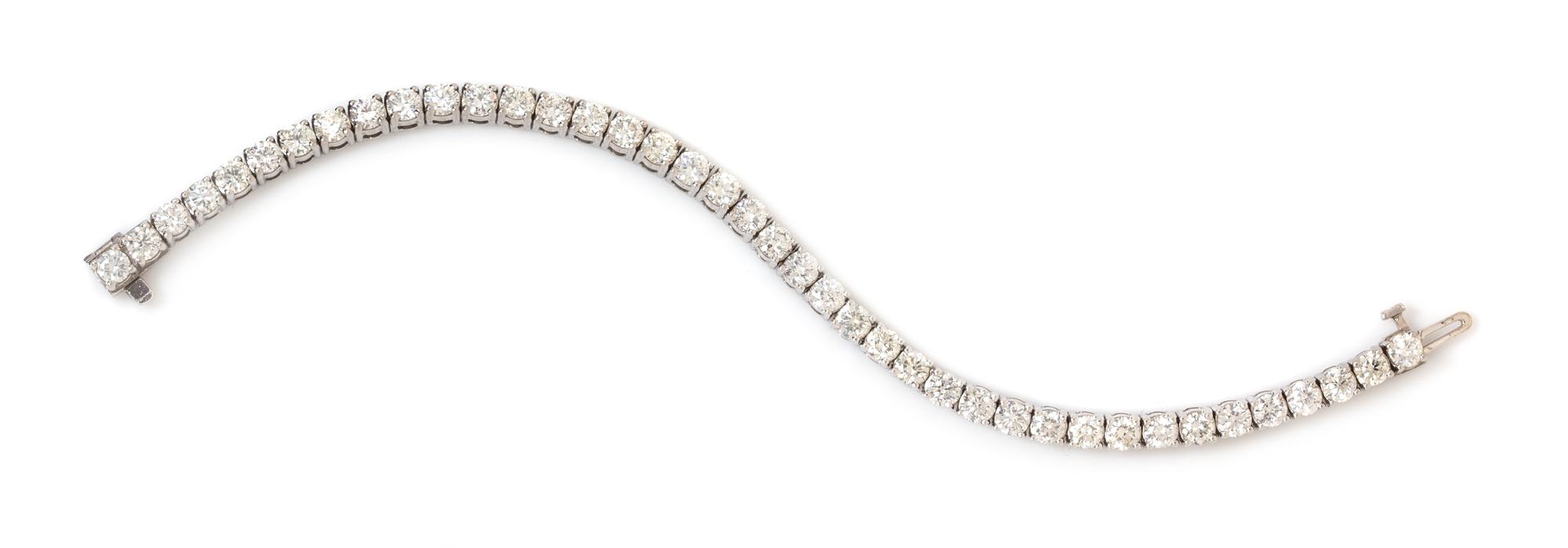 An 18 Karat White Gold and Diamond Line Bracelet, 12.00 dwts.