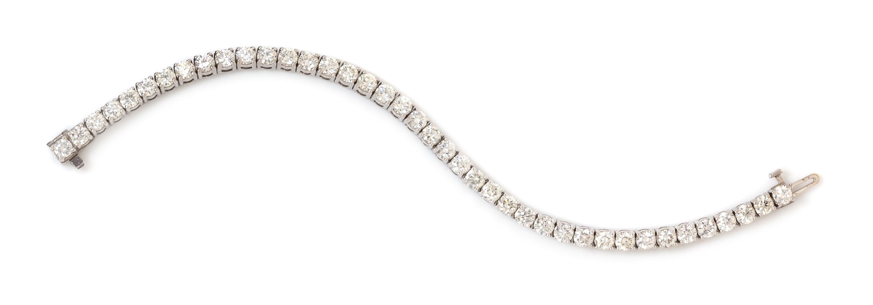 An 18 Karat White Gold and Diamond Line Bracelet, 12.00 dwts.