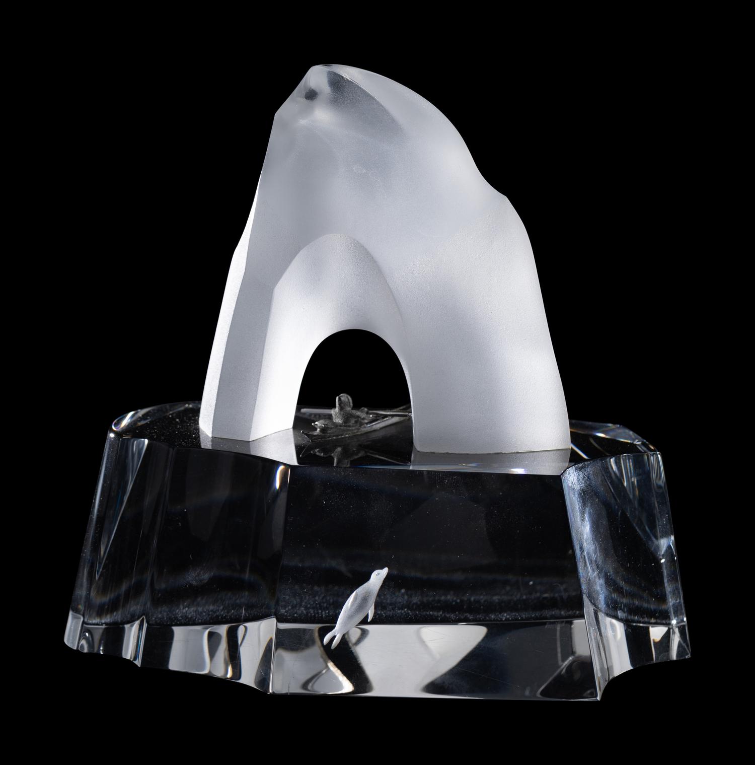 A Steuben Glass and Silver Ice Penguin Sculpture