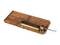A Sectional Comb Music Box in an Enclosed Case