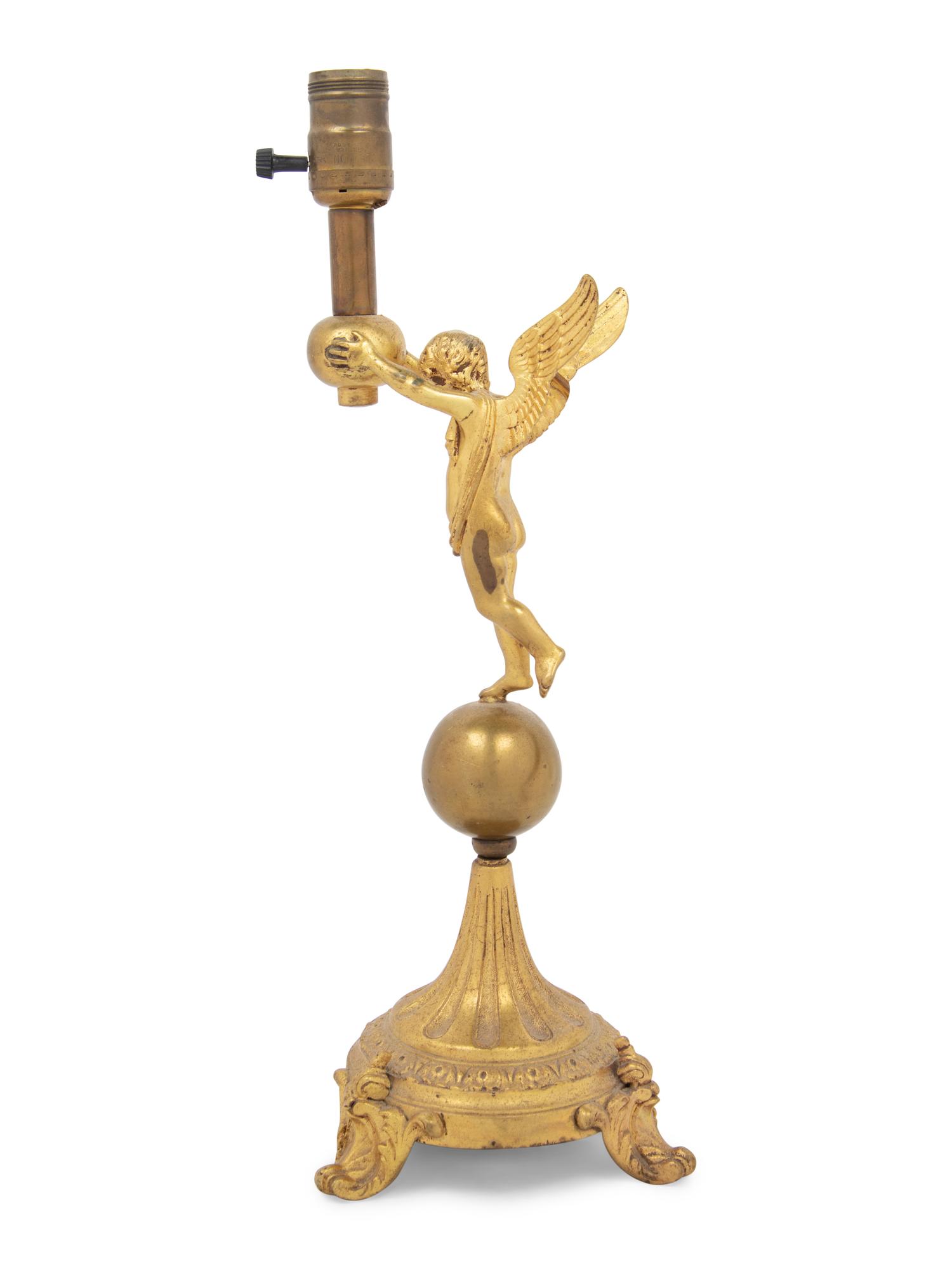 A Continental Gilt Metal Figural Lamp