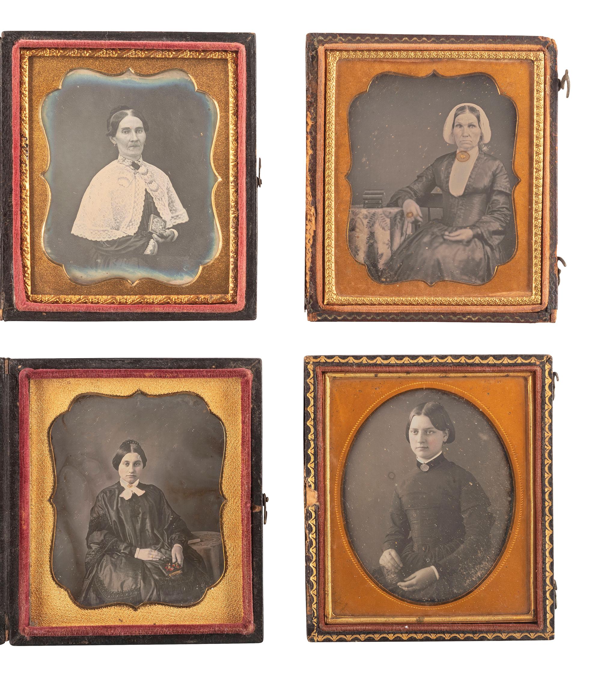 [EARLY PHOTOGRAPHY]. A group of 23 daguerreotypes featuring subjects posed with cased images, including: