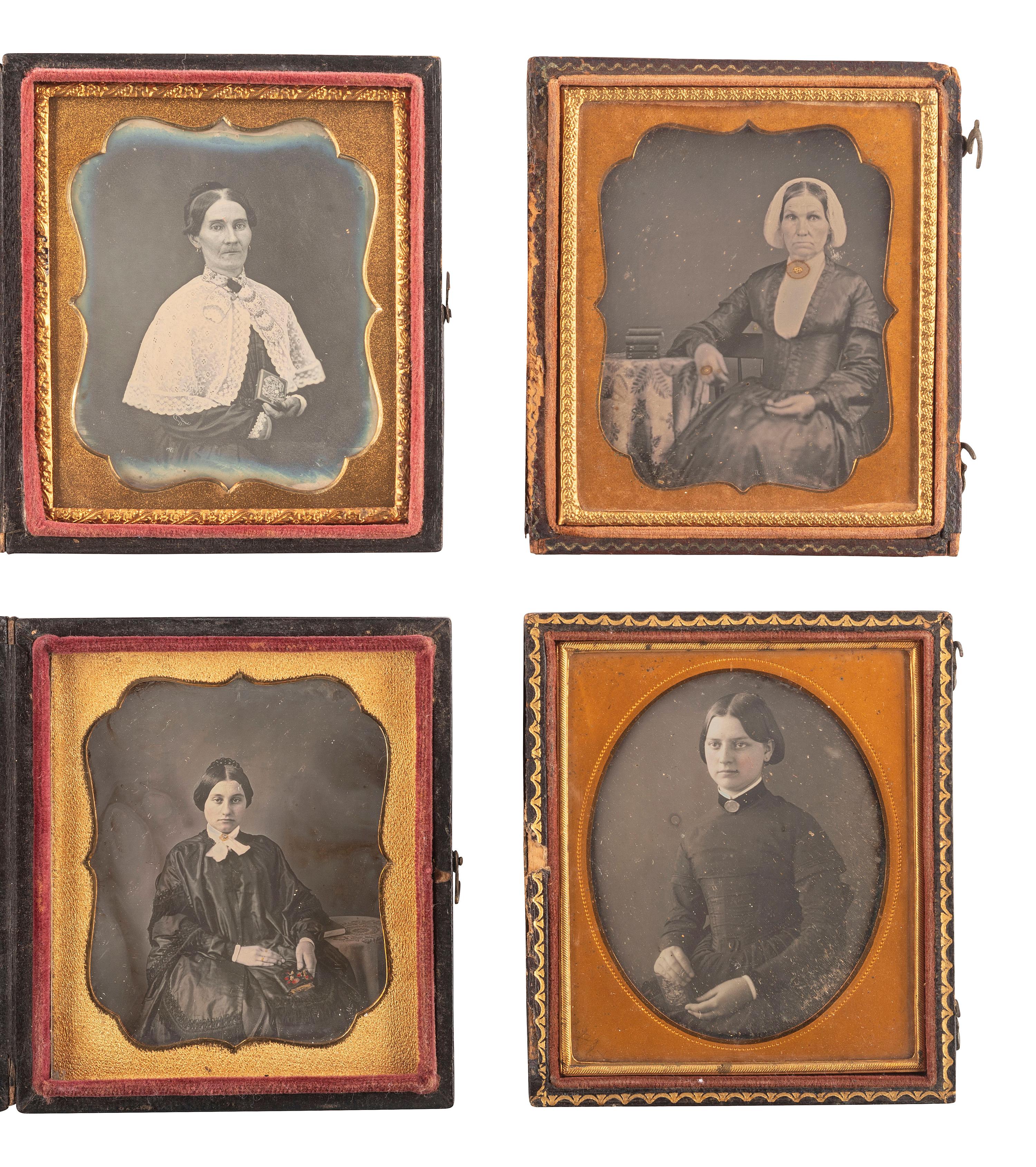 [EARLY PHOTOGRAPHY]. A group of 23 daguerreotypes featuring subjects posed with cased images, including:
