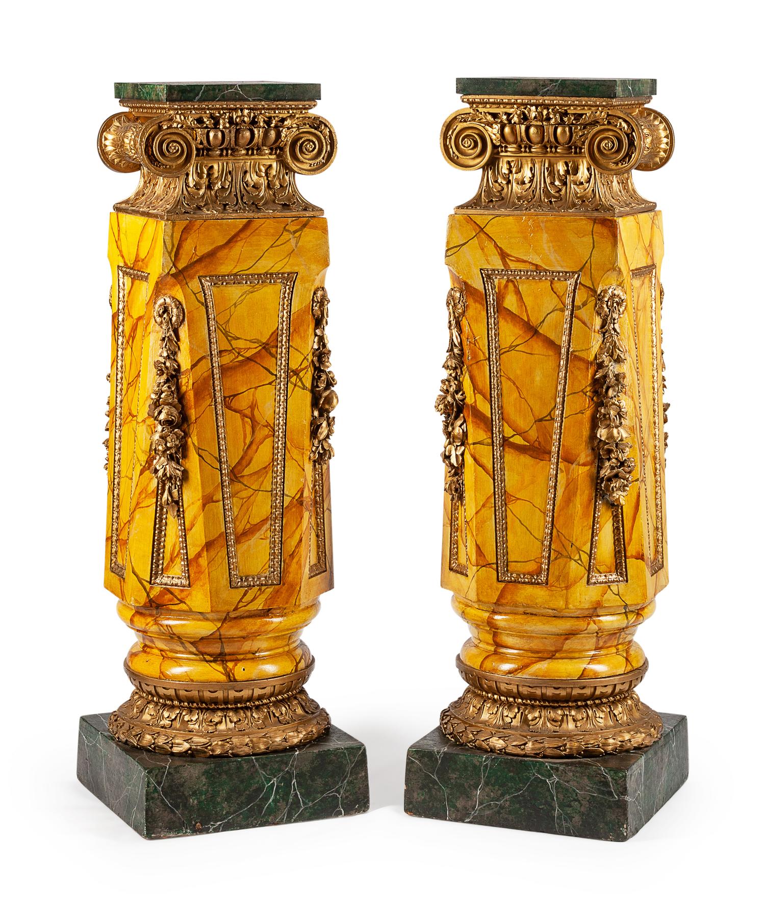 A Pair of Italian Giltwood and Faux Marble Pedestals