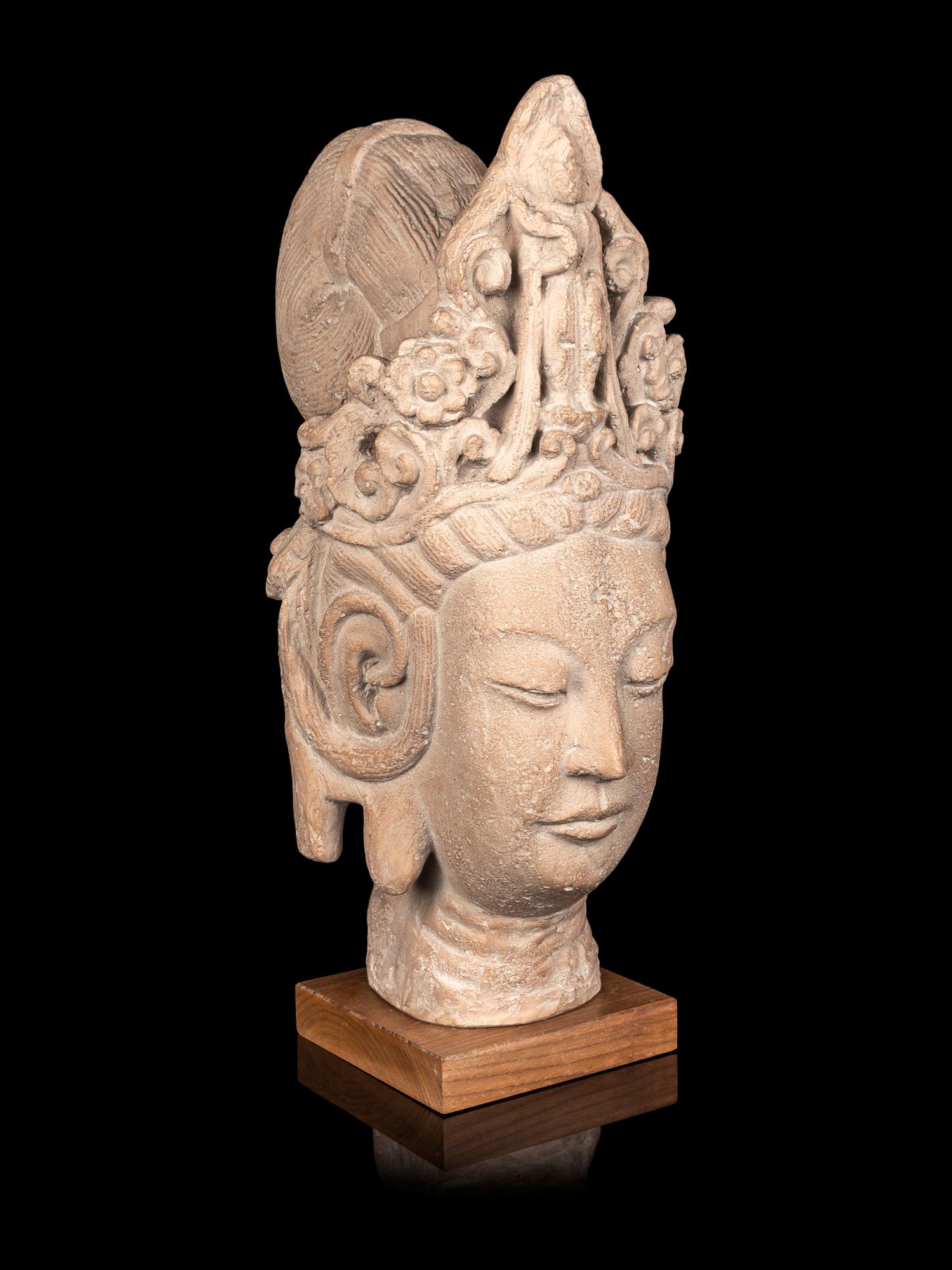 A Chinese Carved Sandstone Head of Guanyin