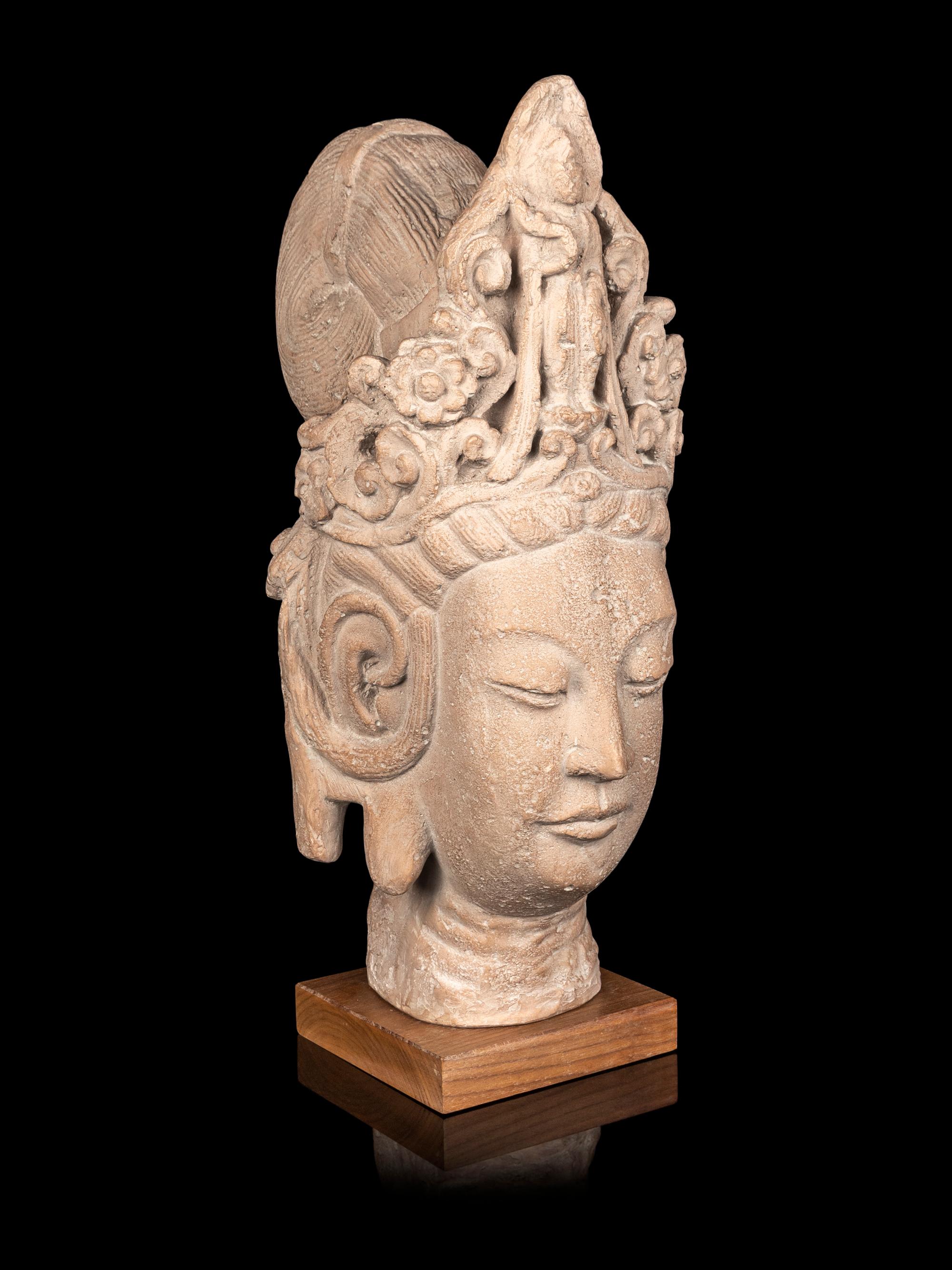 A Chinese Carved Sandstone Head of Guanyin