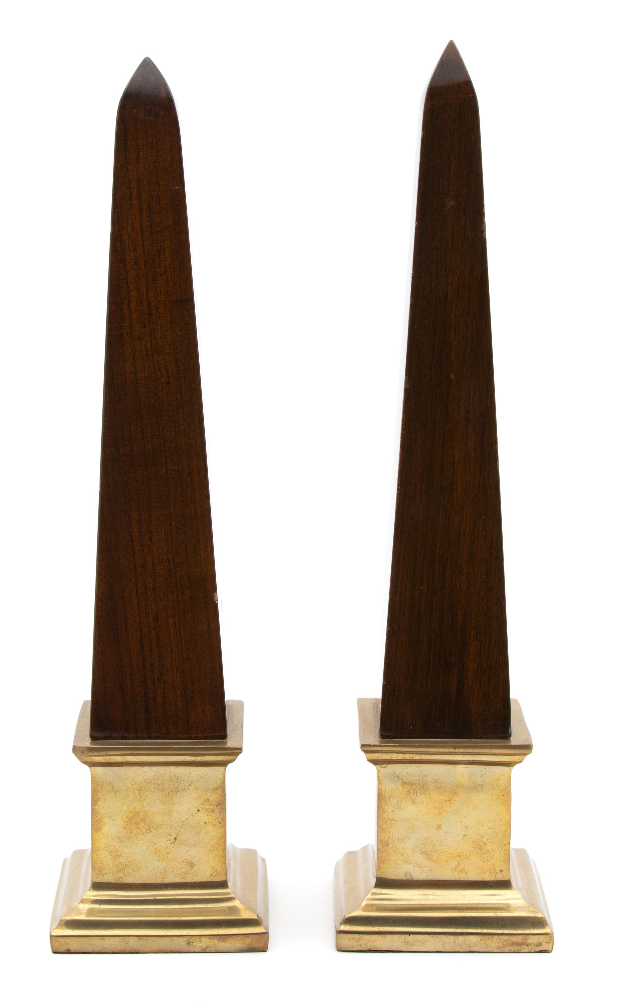 A Pair of Mahogany Obelisks on Brass Plinth Bases Height 15 1/4 inches. — 20TH CENTURY