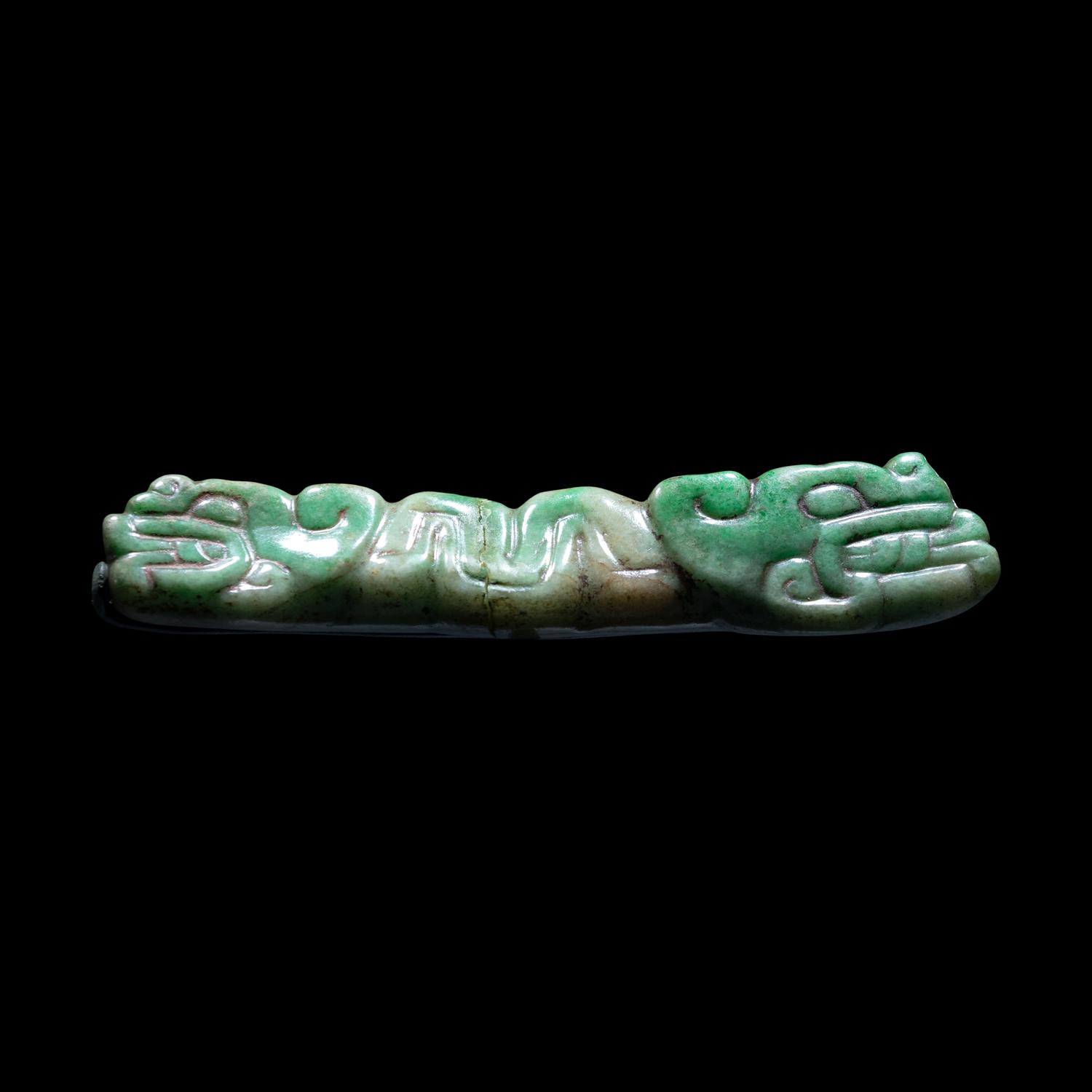 A Maya Jade Serpent Pendant
