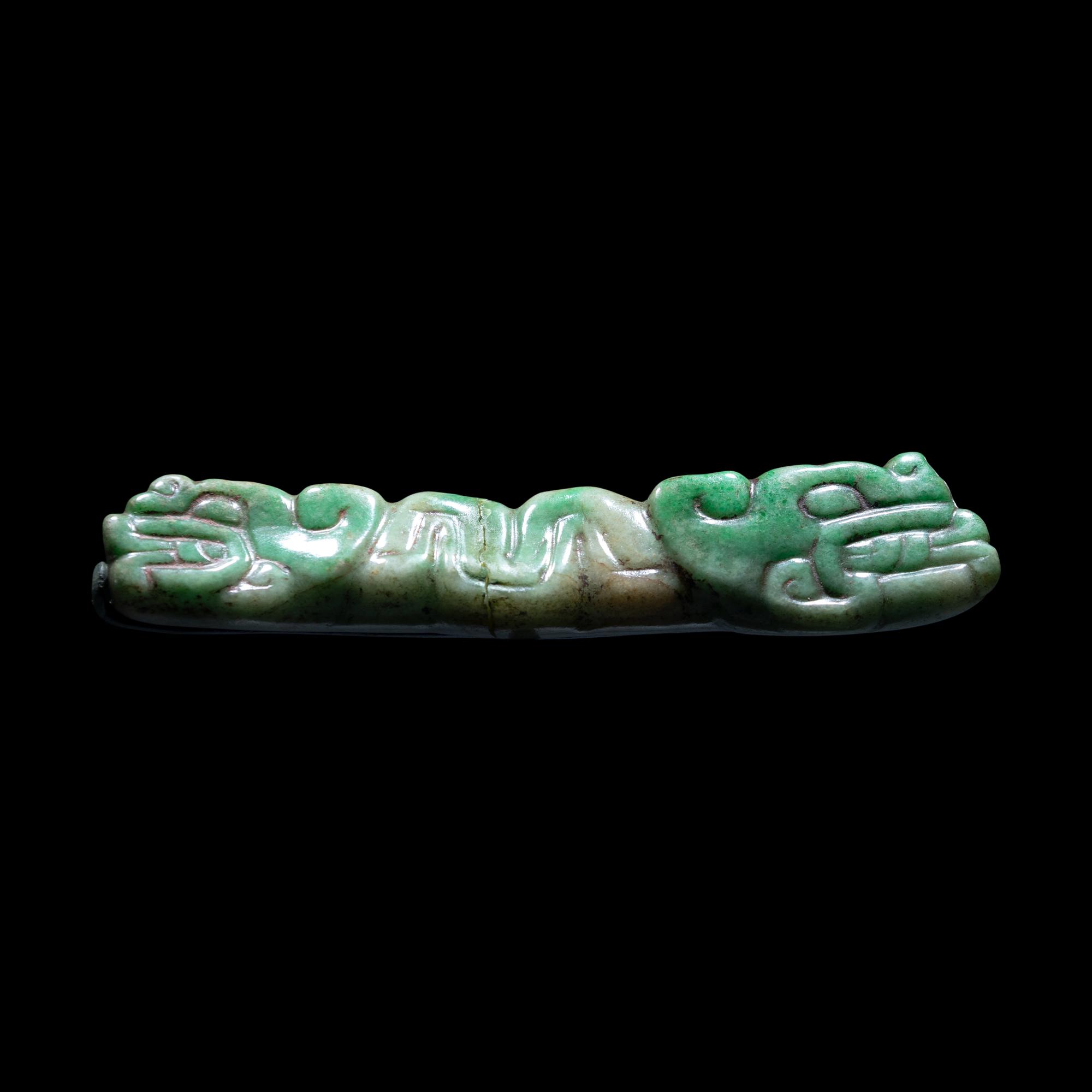A Maya Jade Serpent Pendant