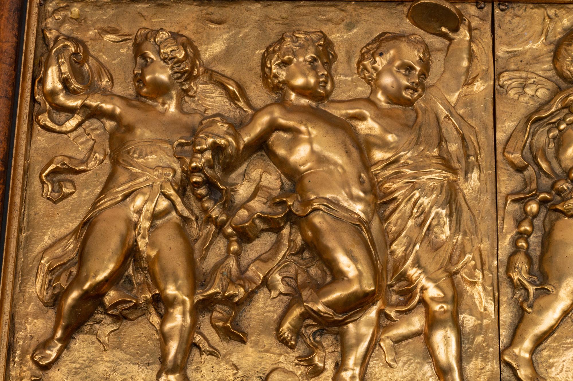 Two Italian Gilt-Bronze Plaques Depicting A Procession of Cupids