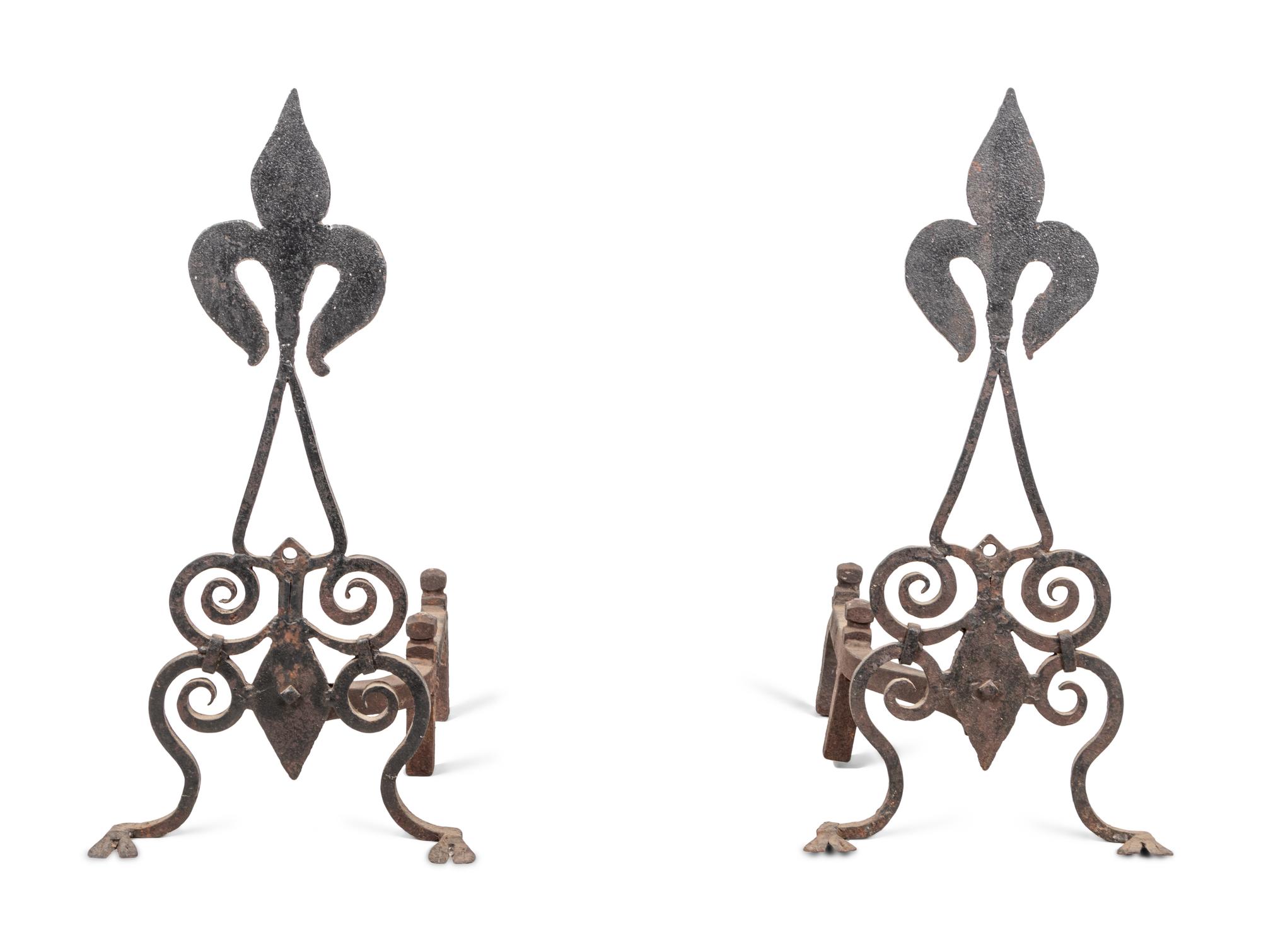 A Pair of Continental Iron Fleur-de-Lis Andirons