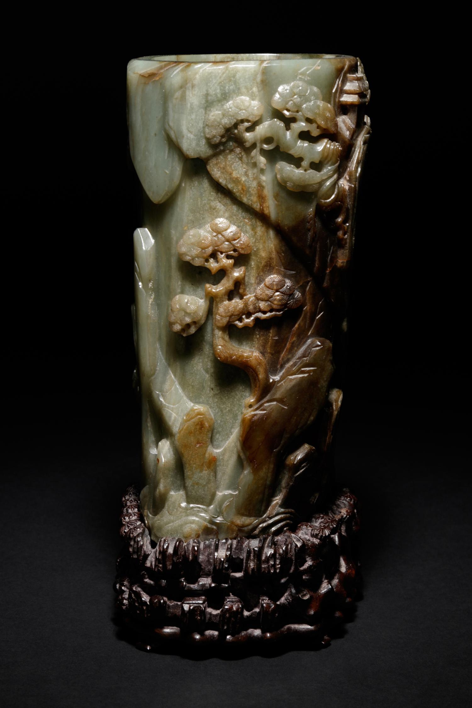 A Carved Celadon and Russet Jade Brush Pot and Stand, Bitong