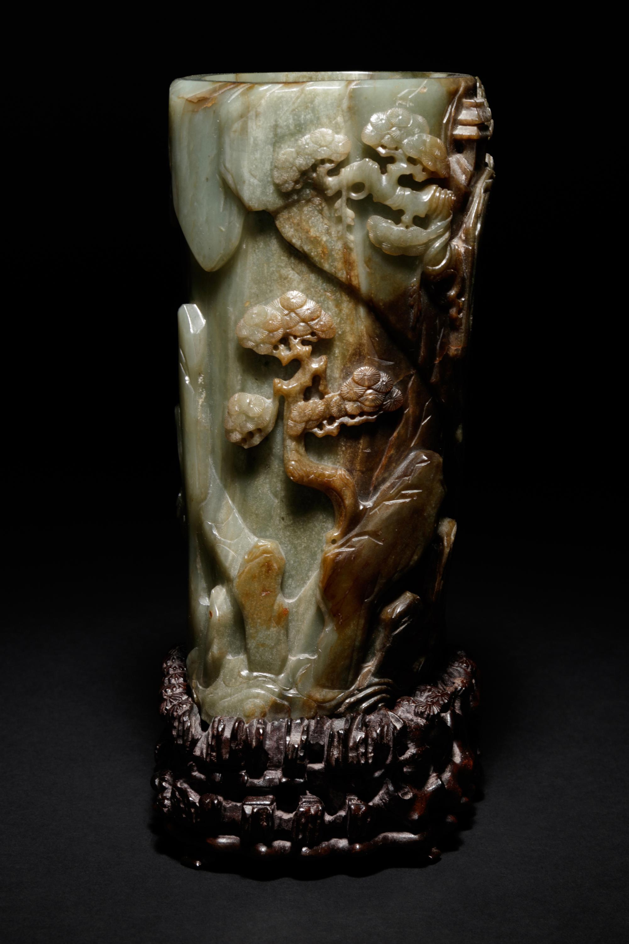 A Carved Celadon and Russet Jade Brush Pot and Stand, Bitong